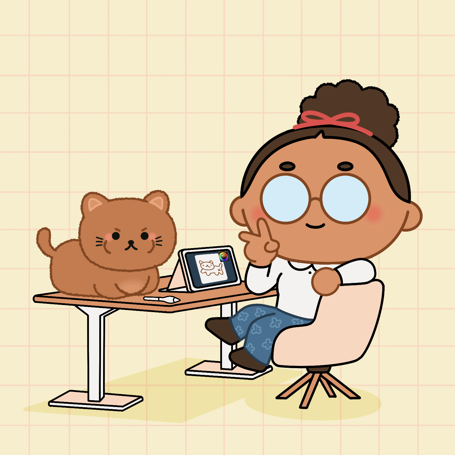 A cartoon girl with glasses and brown hair in a bun, sitting on a beige swivel chair at a wooden desk. She is making a peace sign and smiling. A cute, fluffy brown cat is sitting on the desk next to a drawing tablet, which displays a cat sketch and digital drawing tools. The background features a light beige color with a faint red grid pattern.