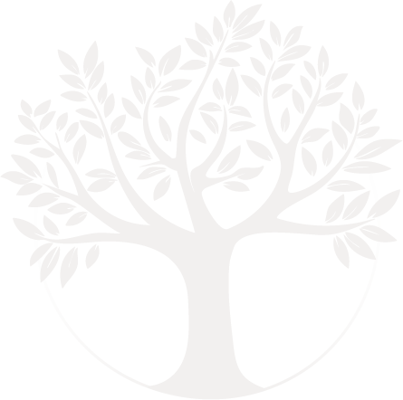 A white tree with many leaves inside a circle on a black background.