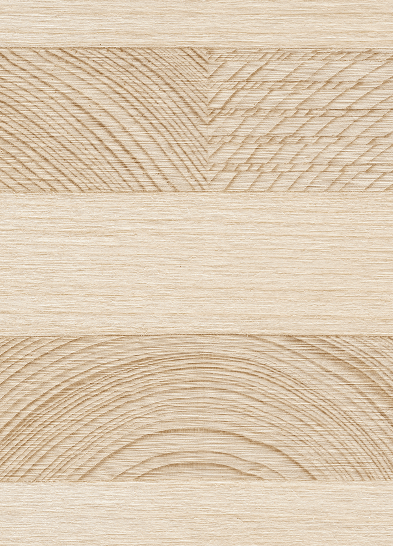 Close-up of a wooden surface with visible grain patterns and textured designs.