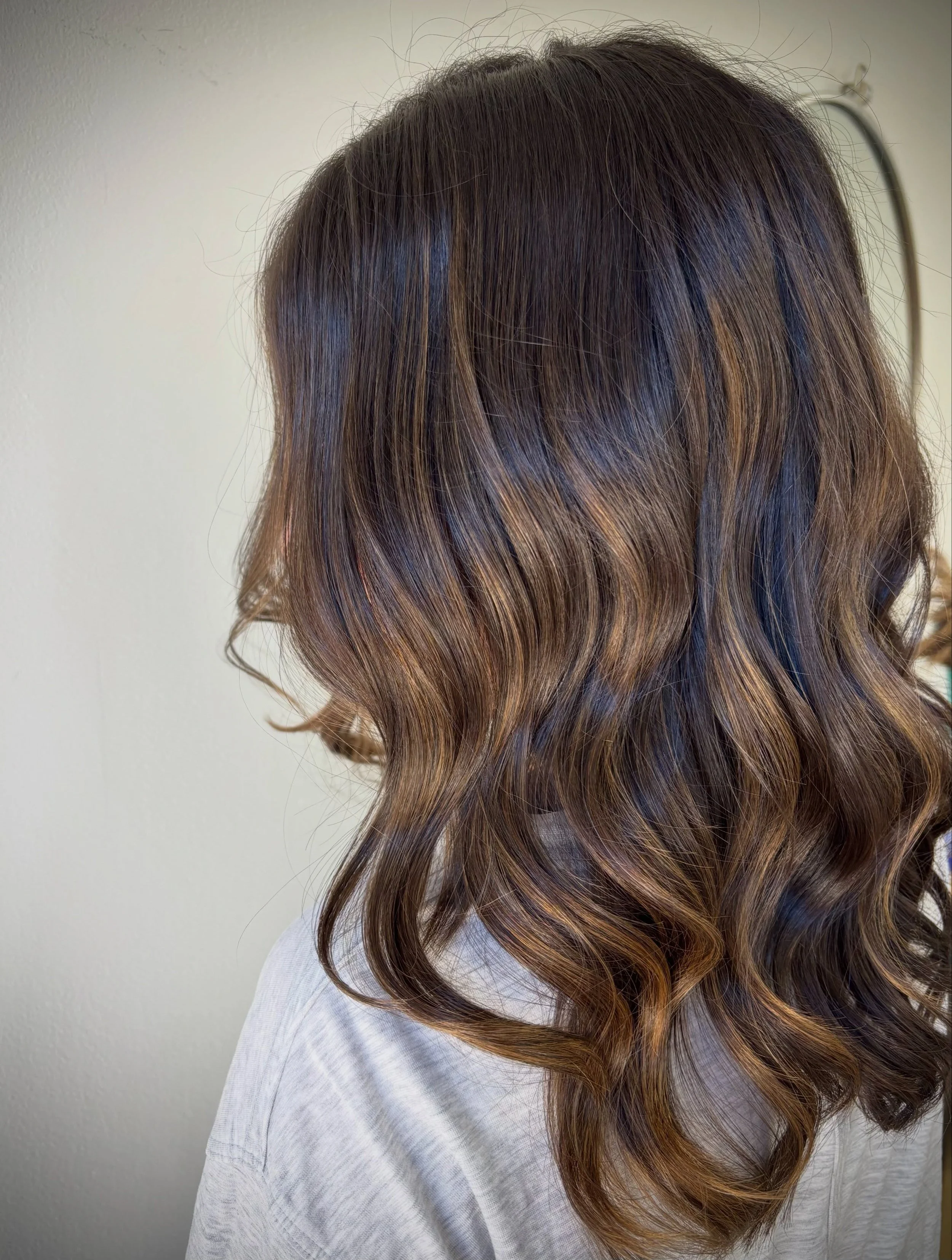Sun-kissed brunette &mdash; low maintenance, lived-in ribbons of brightness to softly enhance your natural look. This is the effect my balayage services offer. 

Whitby Hairstylist
Durham Region Balayage Specialist
Whitby Hair Salon
Durham Region Bru