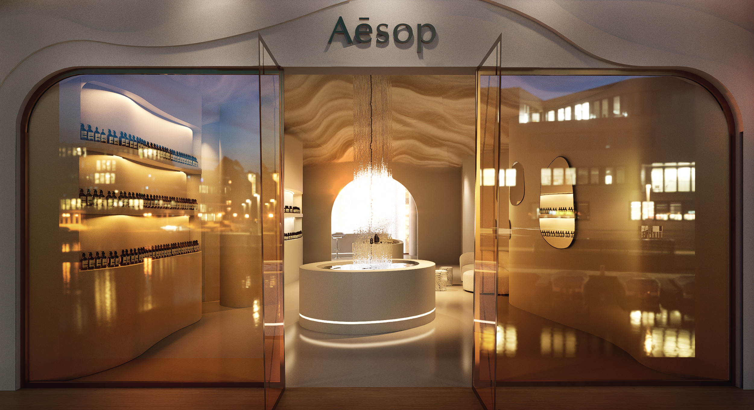 Aesop store entrance with glass doors, shelves of skincare products, a central fountain, and warm lighting.