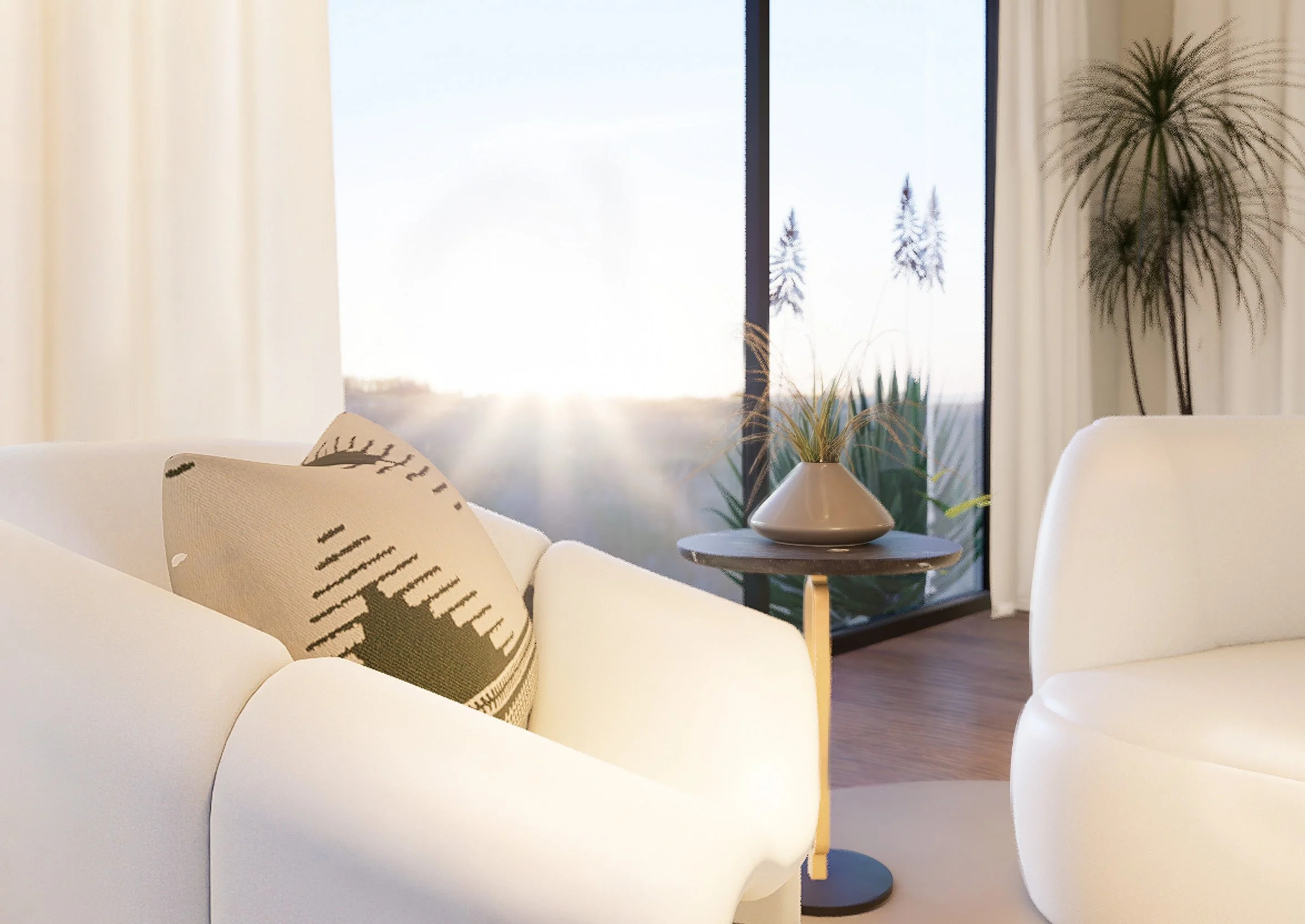 A cozy living room with white sofas, a decorative pillow, a round side table with a potted plant, large window with curtains, and sunlight streaming in, with trees visible outside.