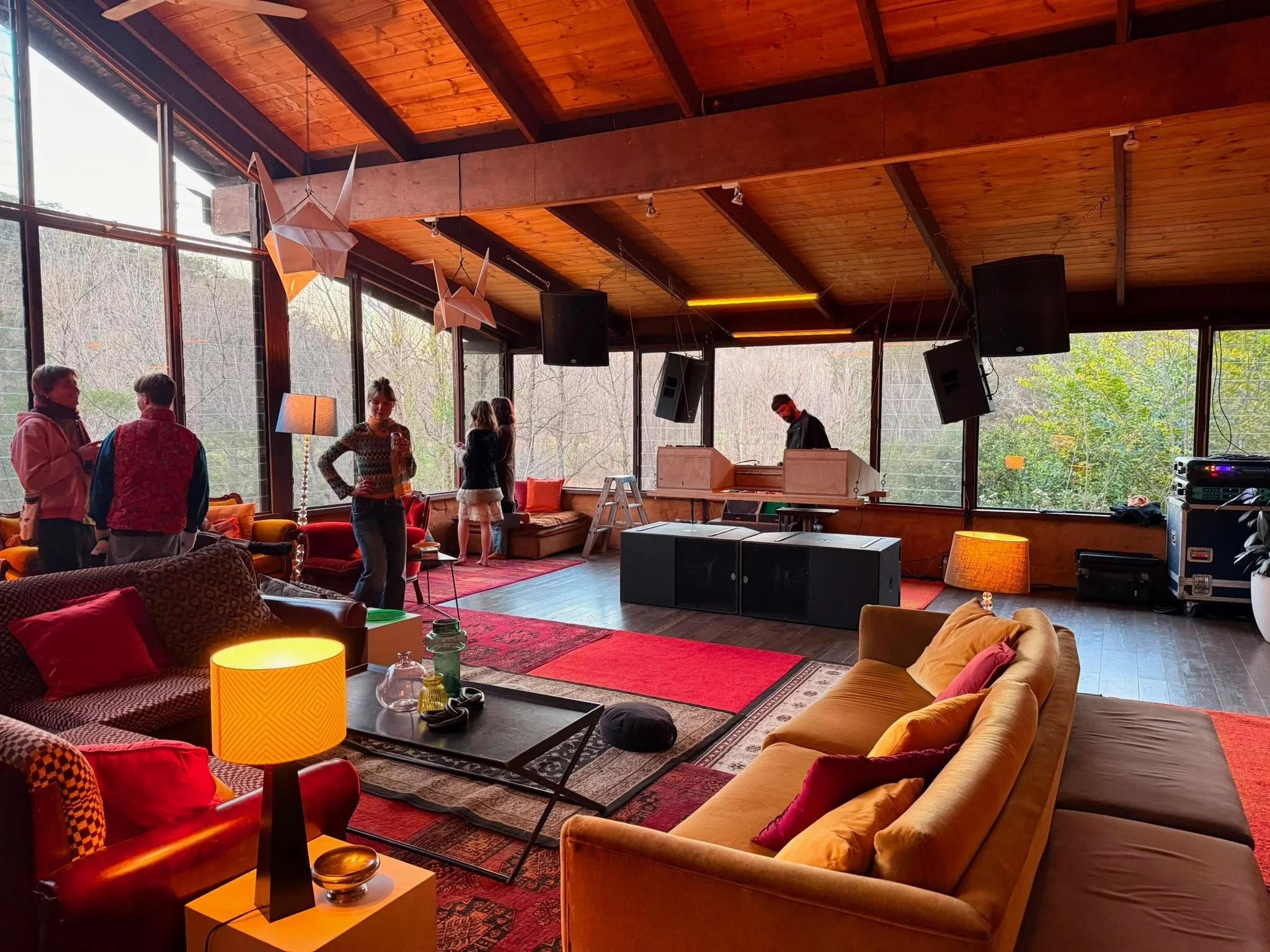 Comfy 70's style lounge room space created at a venue for a party, wedding or celebration