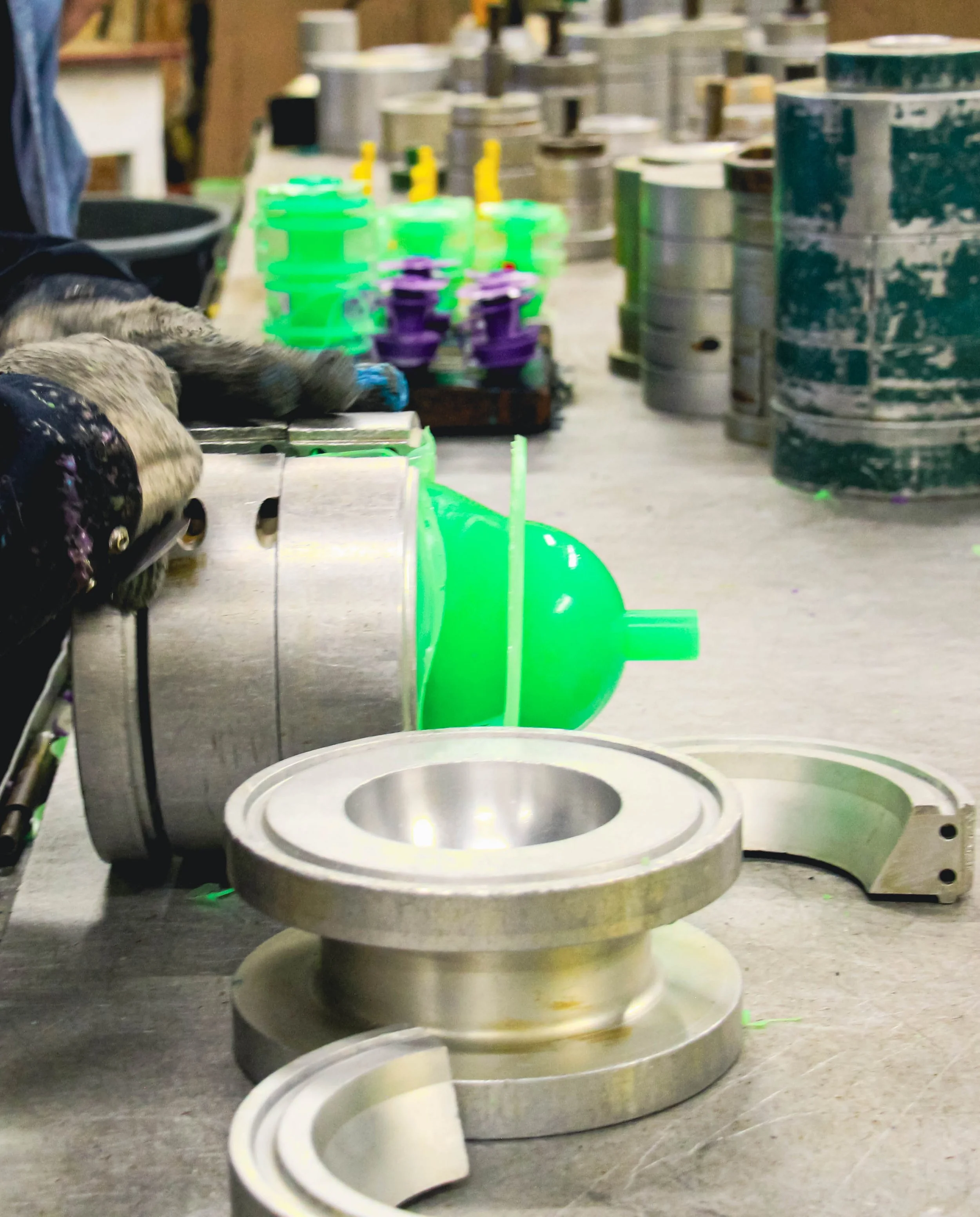 A workbench with polyurethane casts and molds.