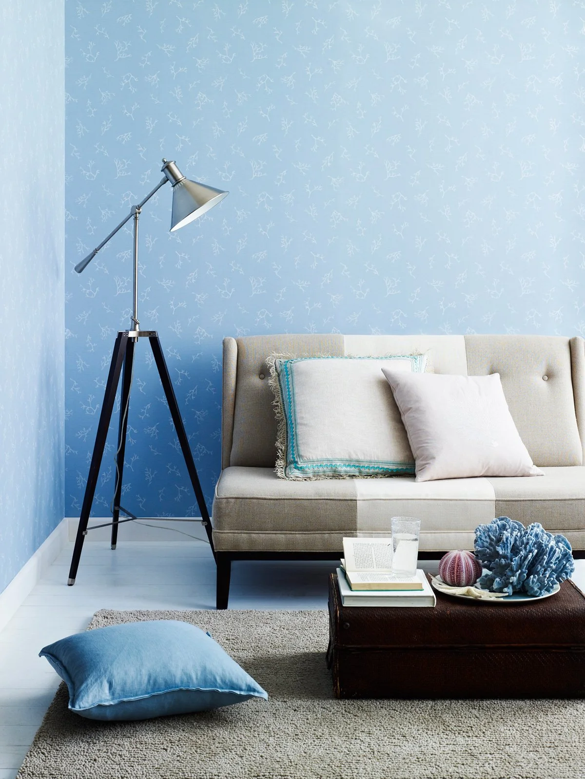 Coral wallpaper by KT Doyle for Moore & Moore, a repeating pattern drawing on the geometry and ornament of Art Deco