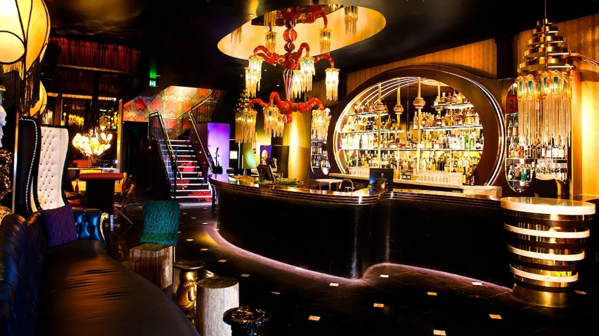 Interior of Laruche Bar and Supper Club in Brisbane, with KT Doyle's wallpaper visible around the central stairwell