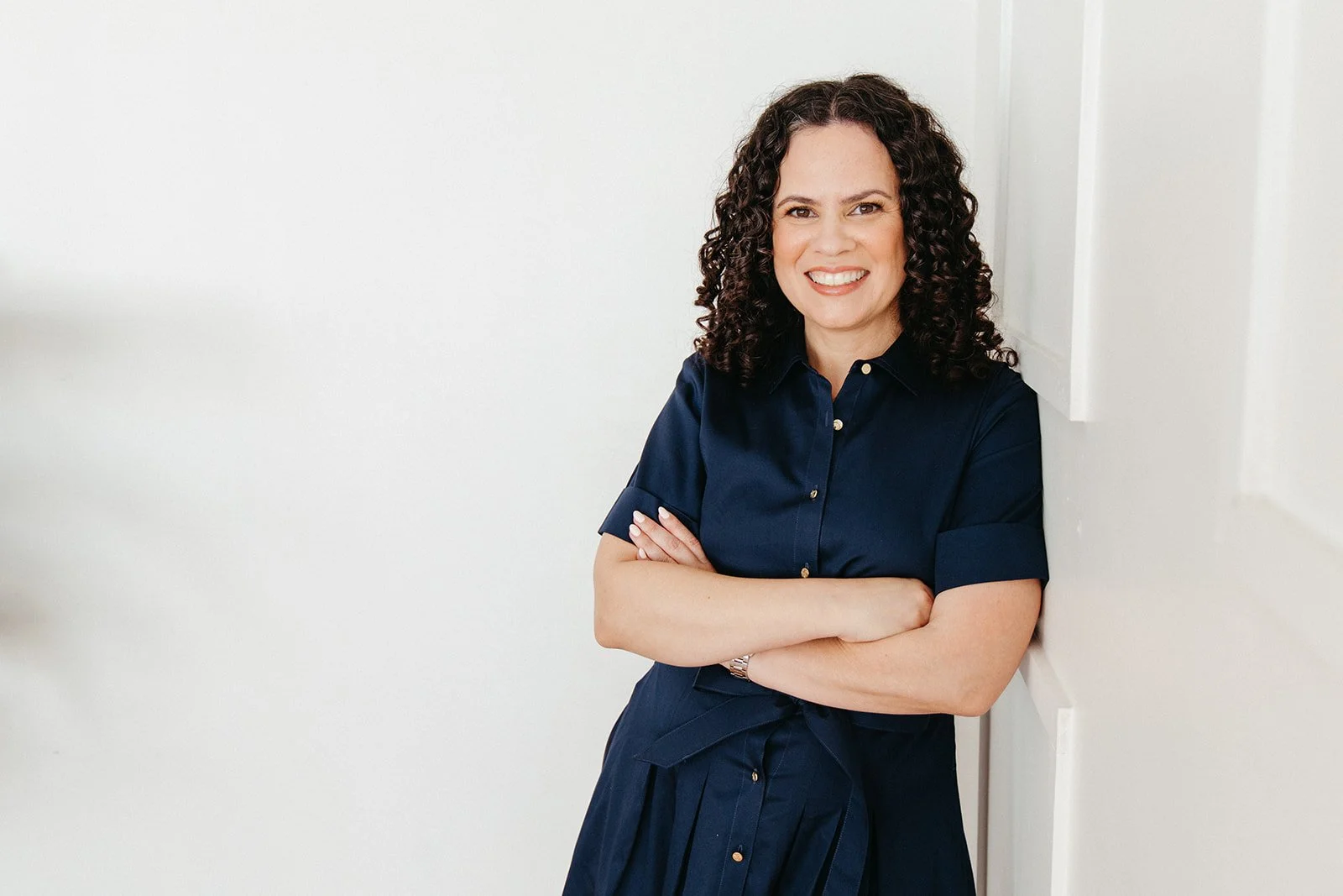 Jaclyn Staubach, LCSW, standing in indoor natural light
