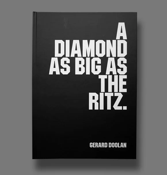 Book titled "A Diamond as Big as the Ritz" by Gerard Doolan with a black cover and white bold text.