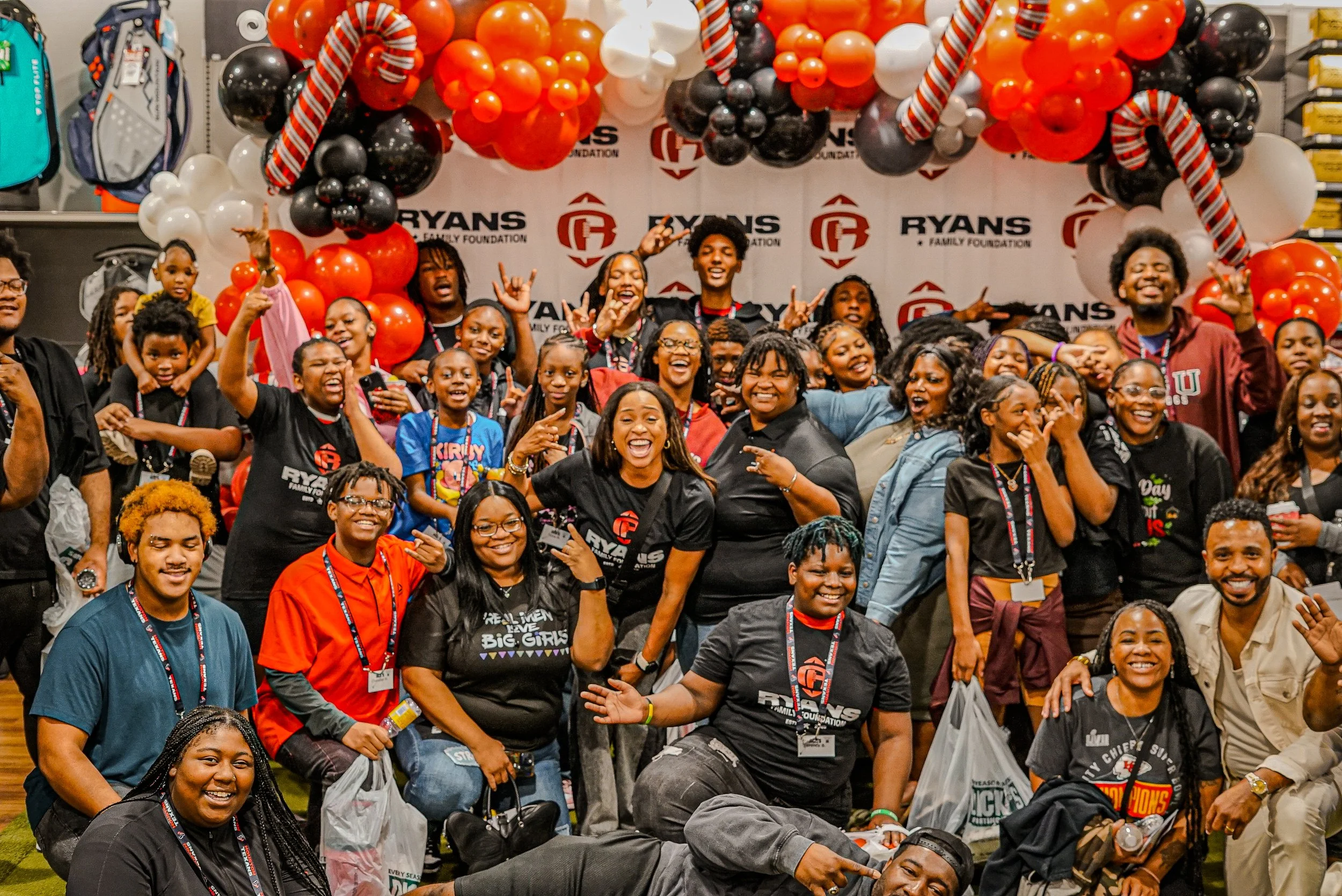 Mrs. Jamila Ryans having fun with the families during the Holiday Shopping Experience.