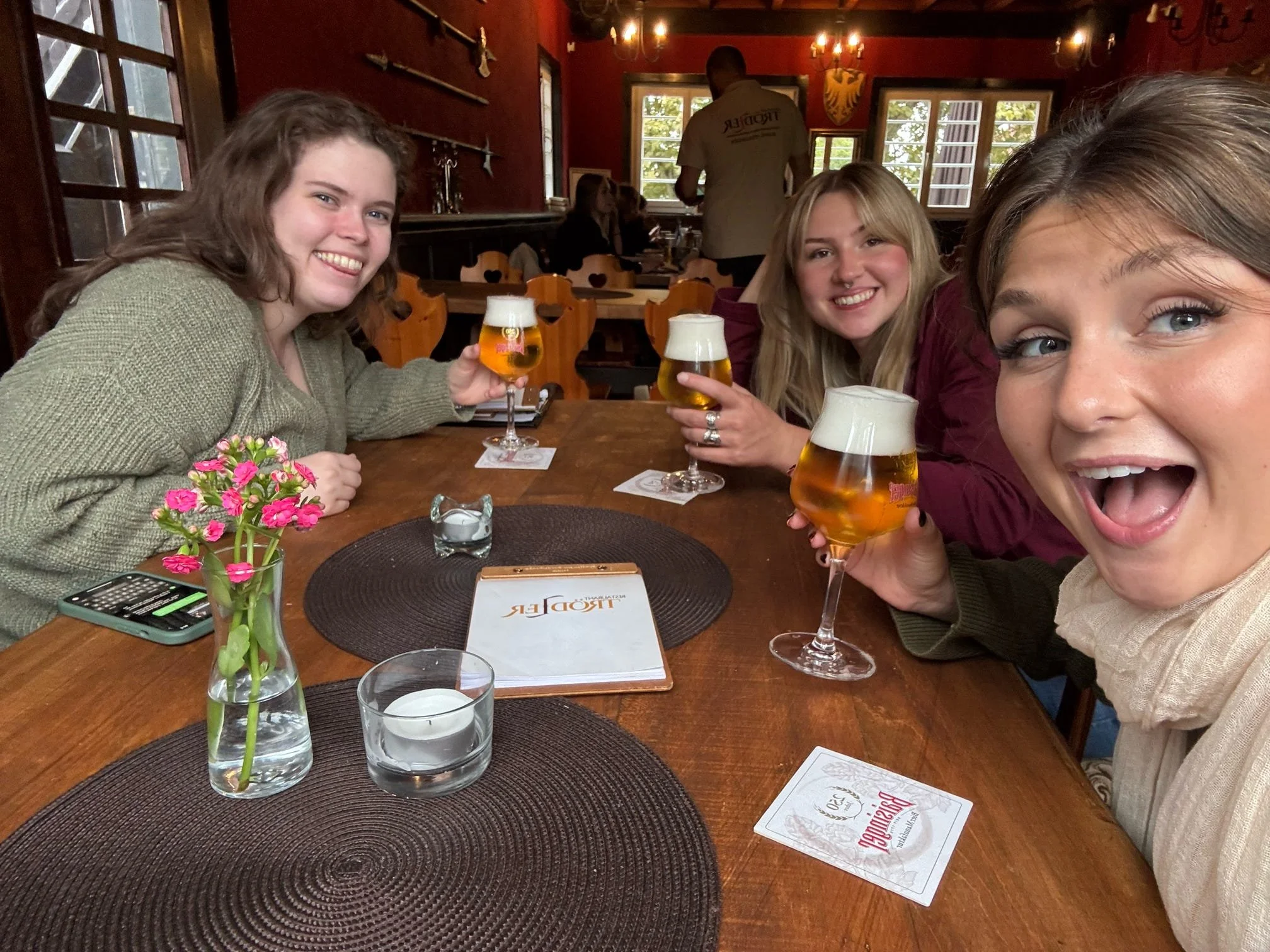 A fun, social group dinner at a traditional German restaurant during a Sunrise Travel hosted European tour.