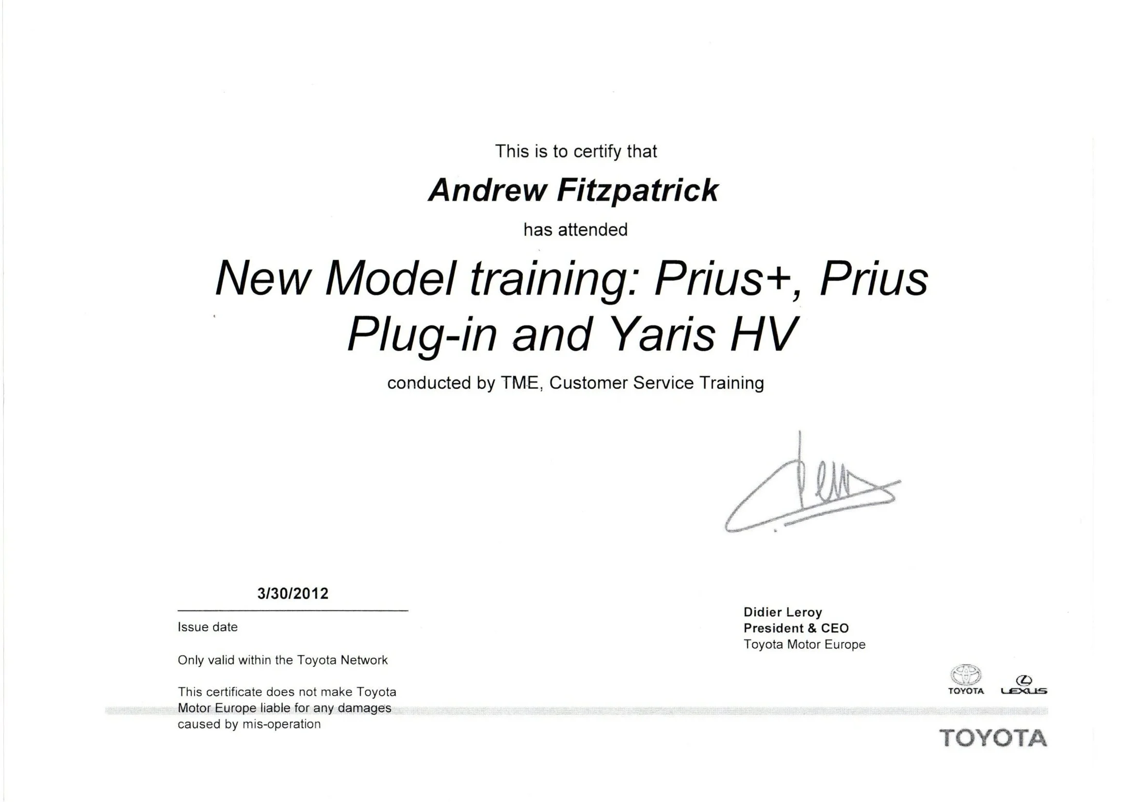 Certificate of attendance awarded to Andrew Fitzpatrick for a training session on Prius+, Prius Plug-in, and Yaris HV conducted by Toyota Motor Europe on March 30, 2012, signed by Didier Leroy, Toyota's President & CEO, with logos of Toyota and Lexus