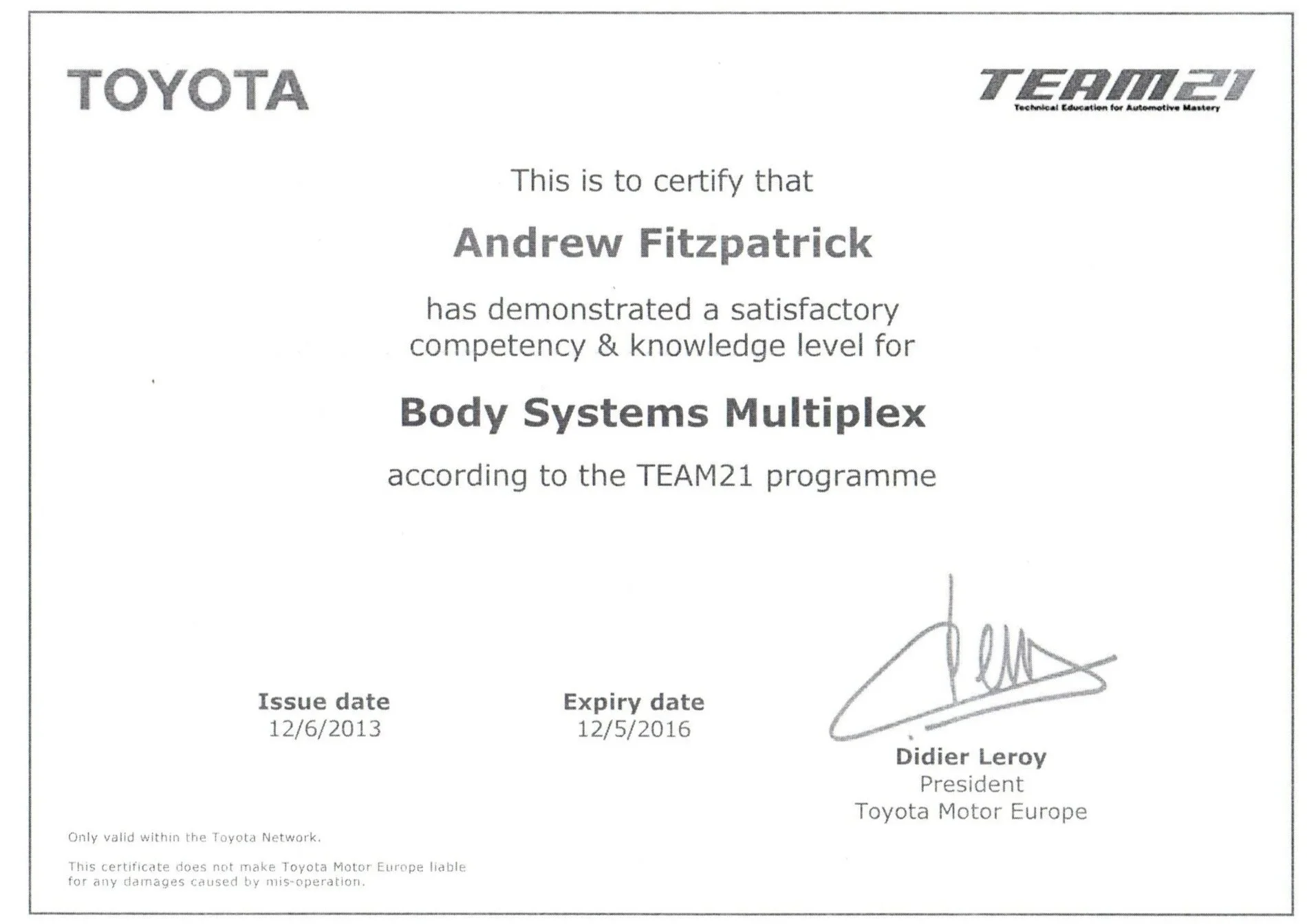 A certificate awarded to Andrew Fitzpatrick for demonstrating competency in Body Systems Multiplex, issued by Toyota and TEAM21, signed by Didier Leroy, with issue date 12/6/2013 and expiry date 12/5/2016.