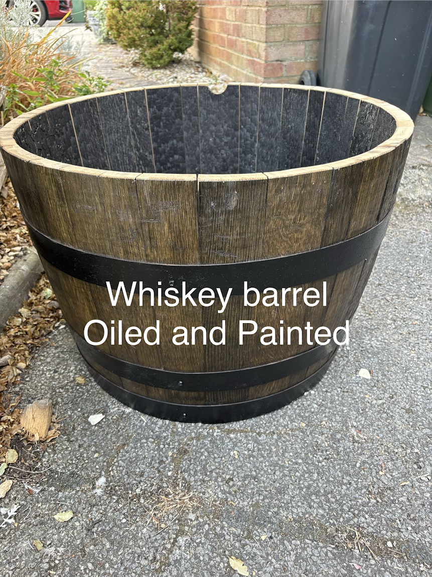 whiskey barrel oiled and painted.png