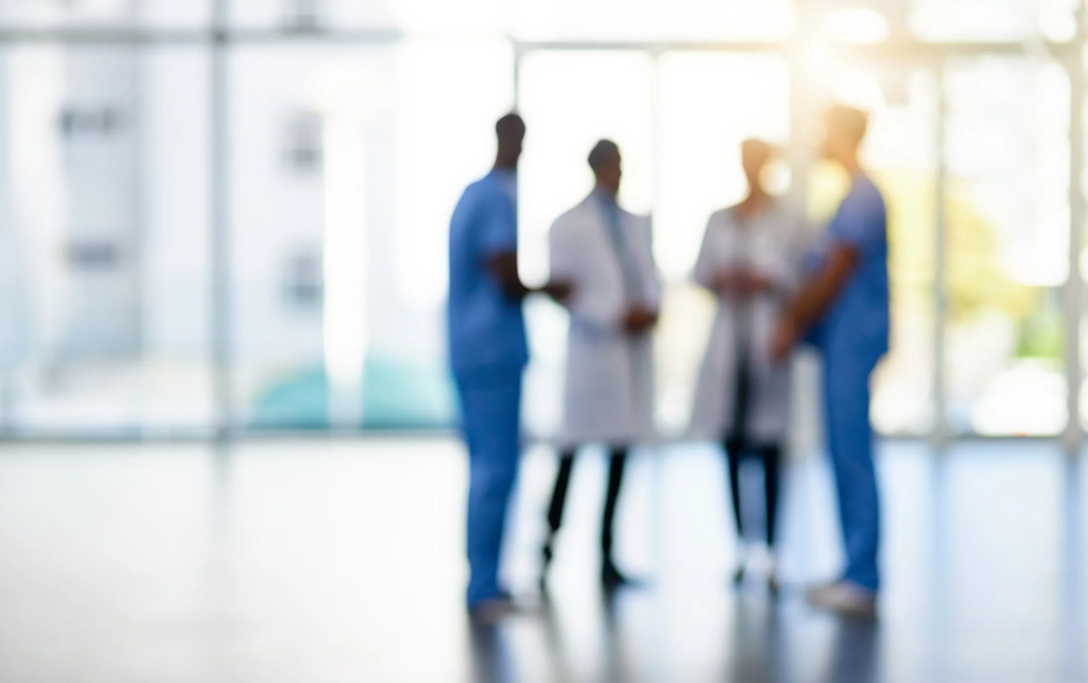 NHS clinicians in a hospital setting