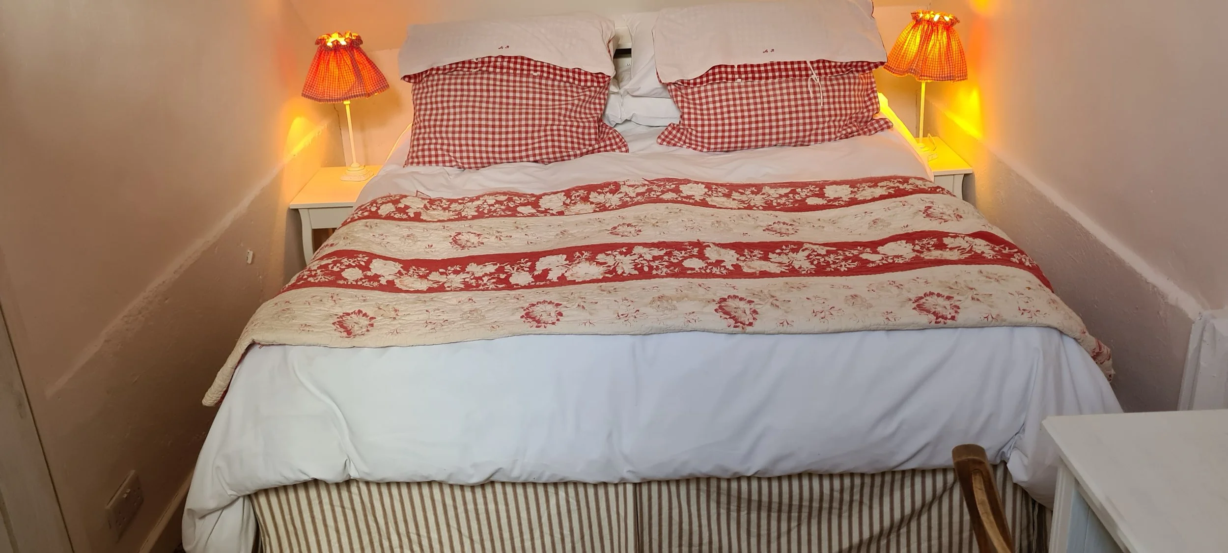 Double bed with lights and bedside tables