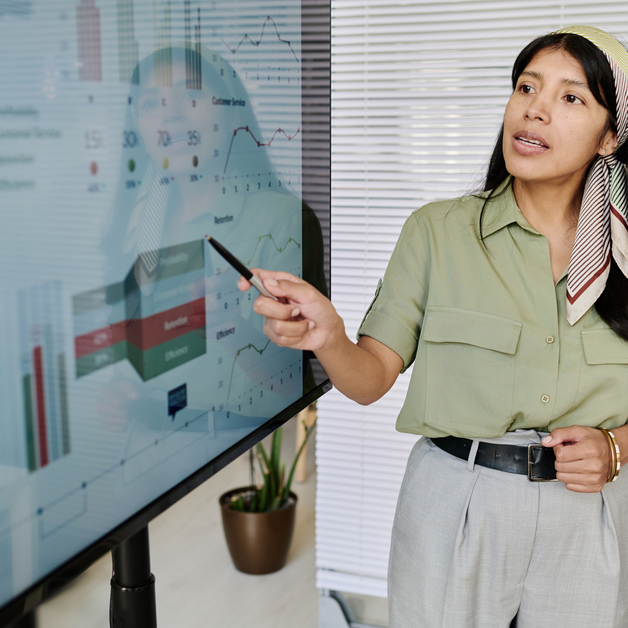 Female manager explaining using screen