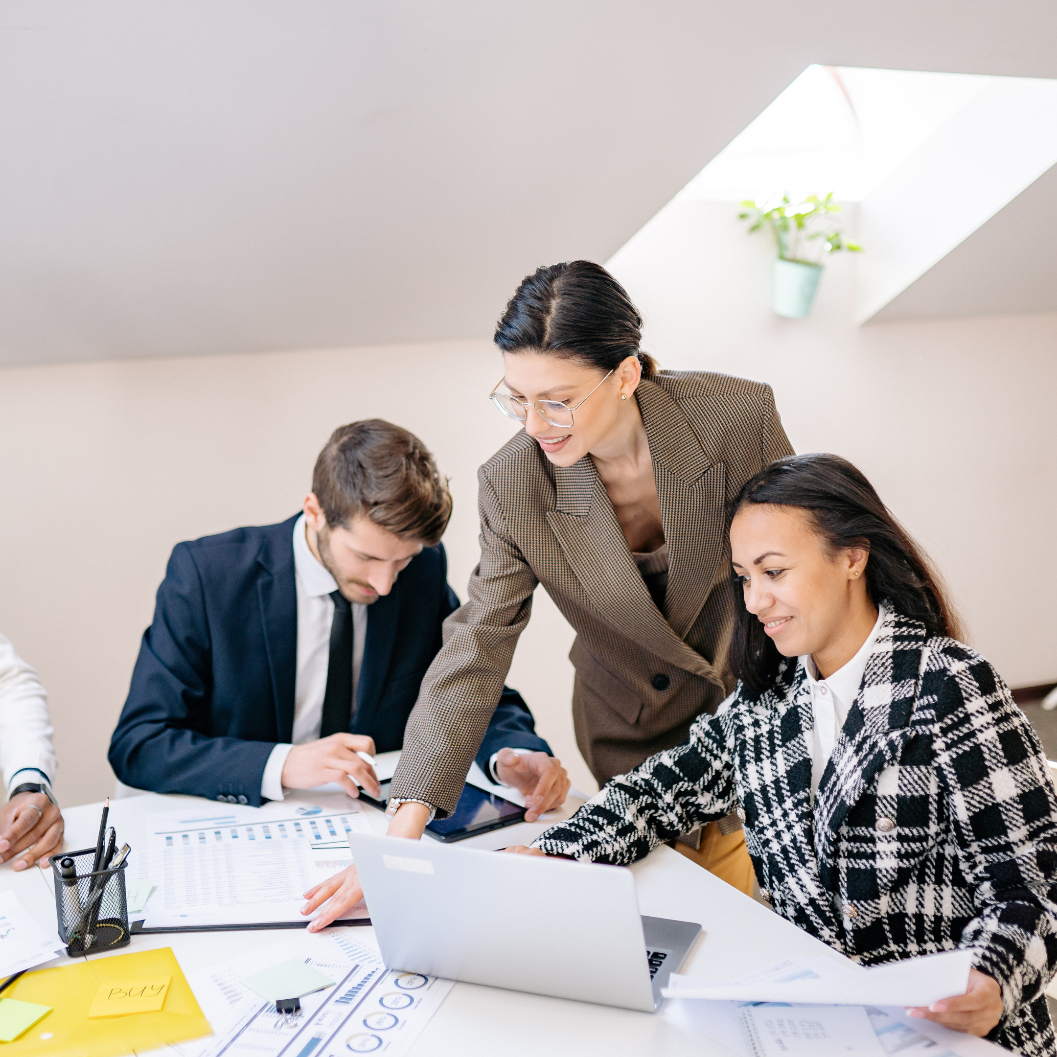 Group led by team leader in discussion