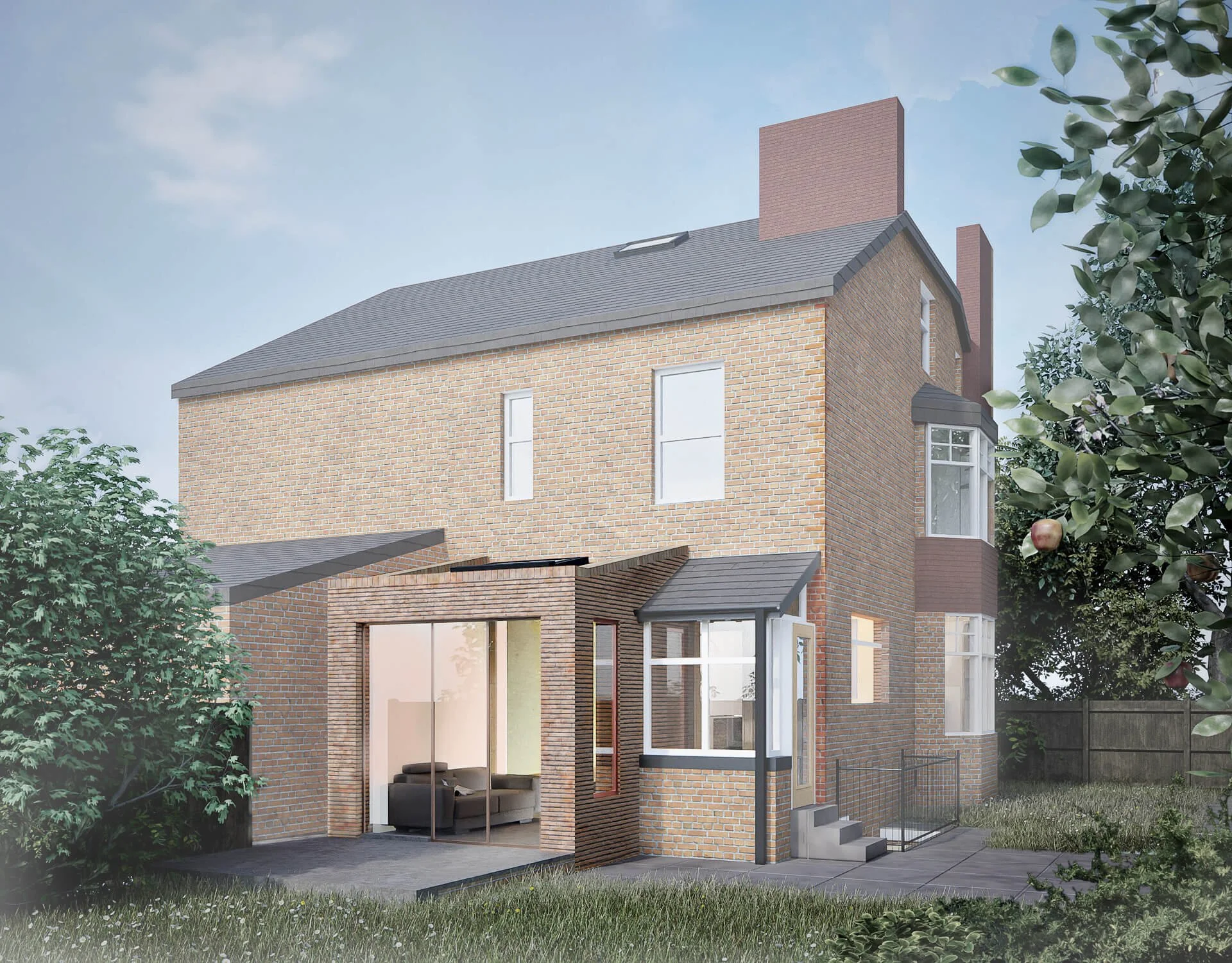 A modern multi-story house with brick exterior walls, large windows, and a small patio with a glass door and sofa, surrounded by green grass, trees, and a wooden fence.