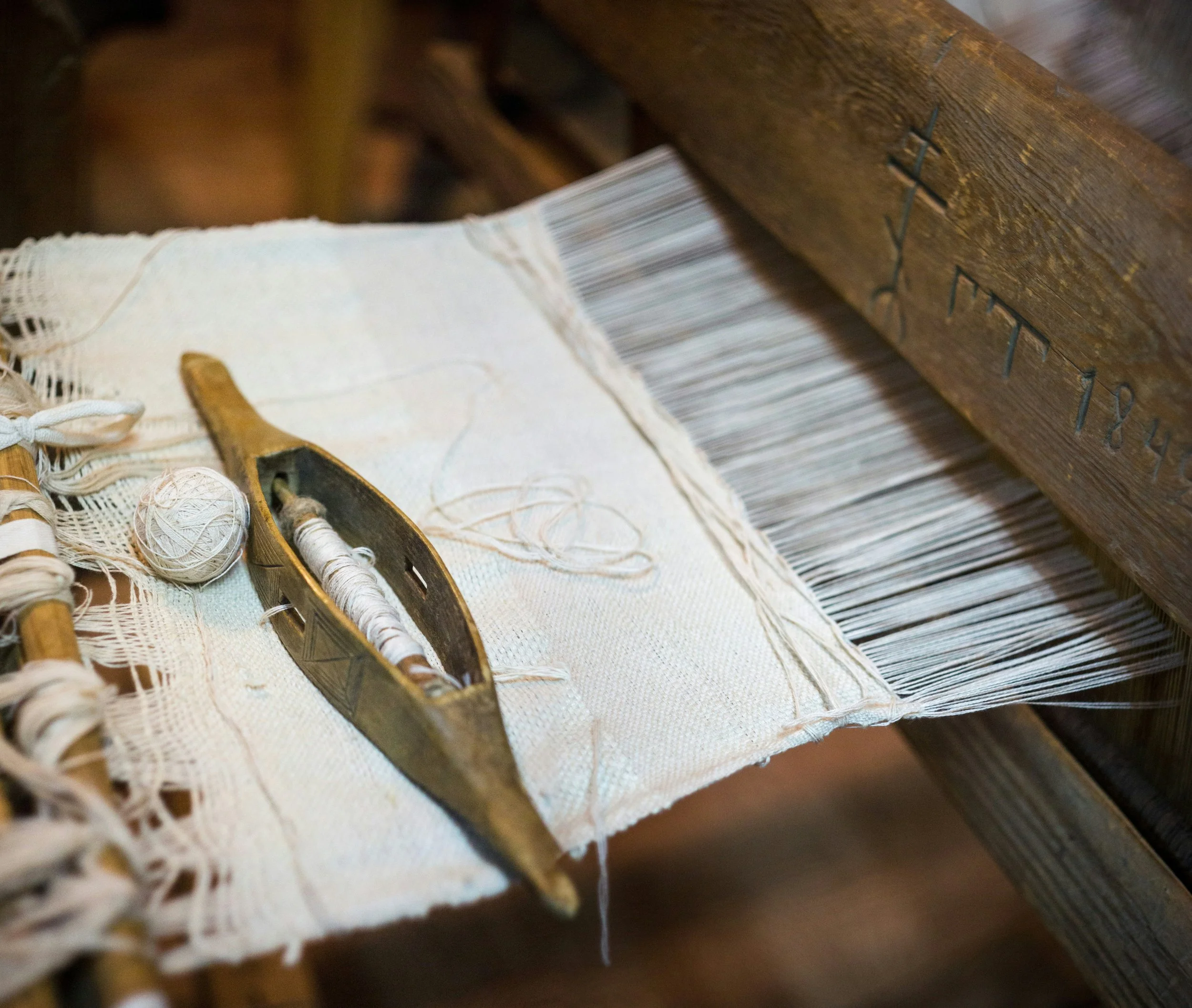 Close up of traditional textile weaving showing care and craft