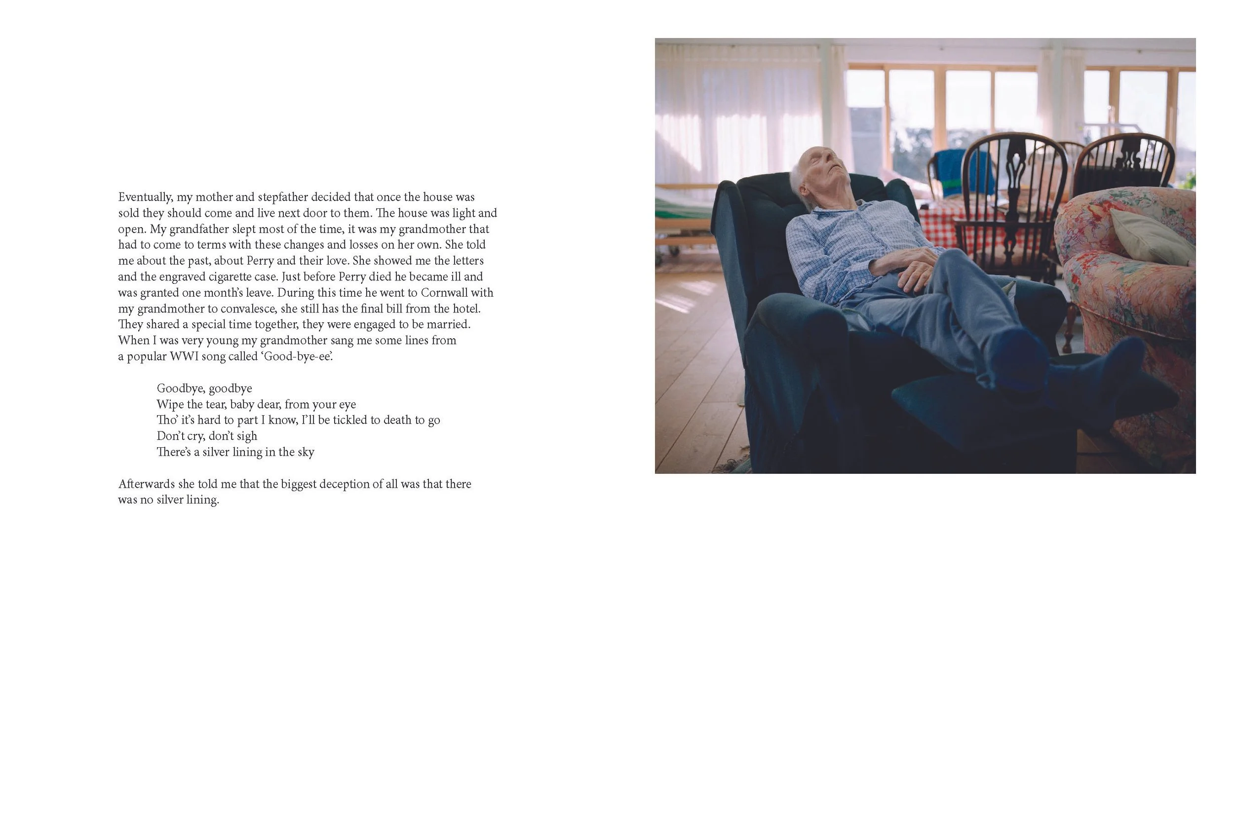 An elderly man with gray hair lays back in a recliner with his eyes closed in a sunlit living room with large windows and various chairs and furniture.