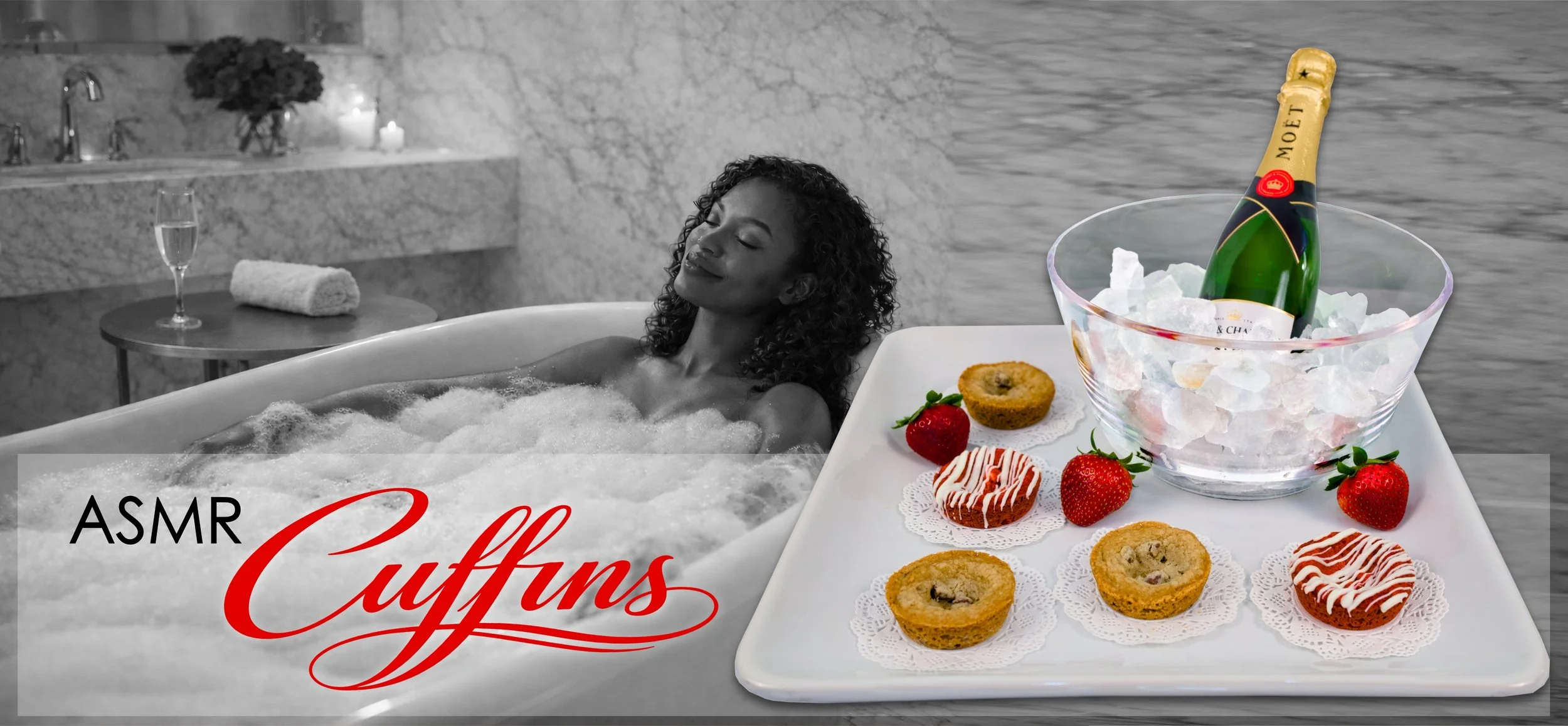 A woman relaxing in a bubble bath with a tray of assorted muffins, strawberries, and a bottle of Moët champagne ice in a bowl, with a background of a marble bathroom and candles.