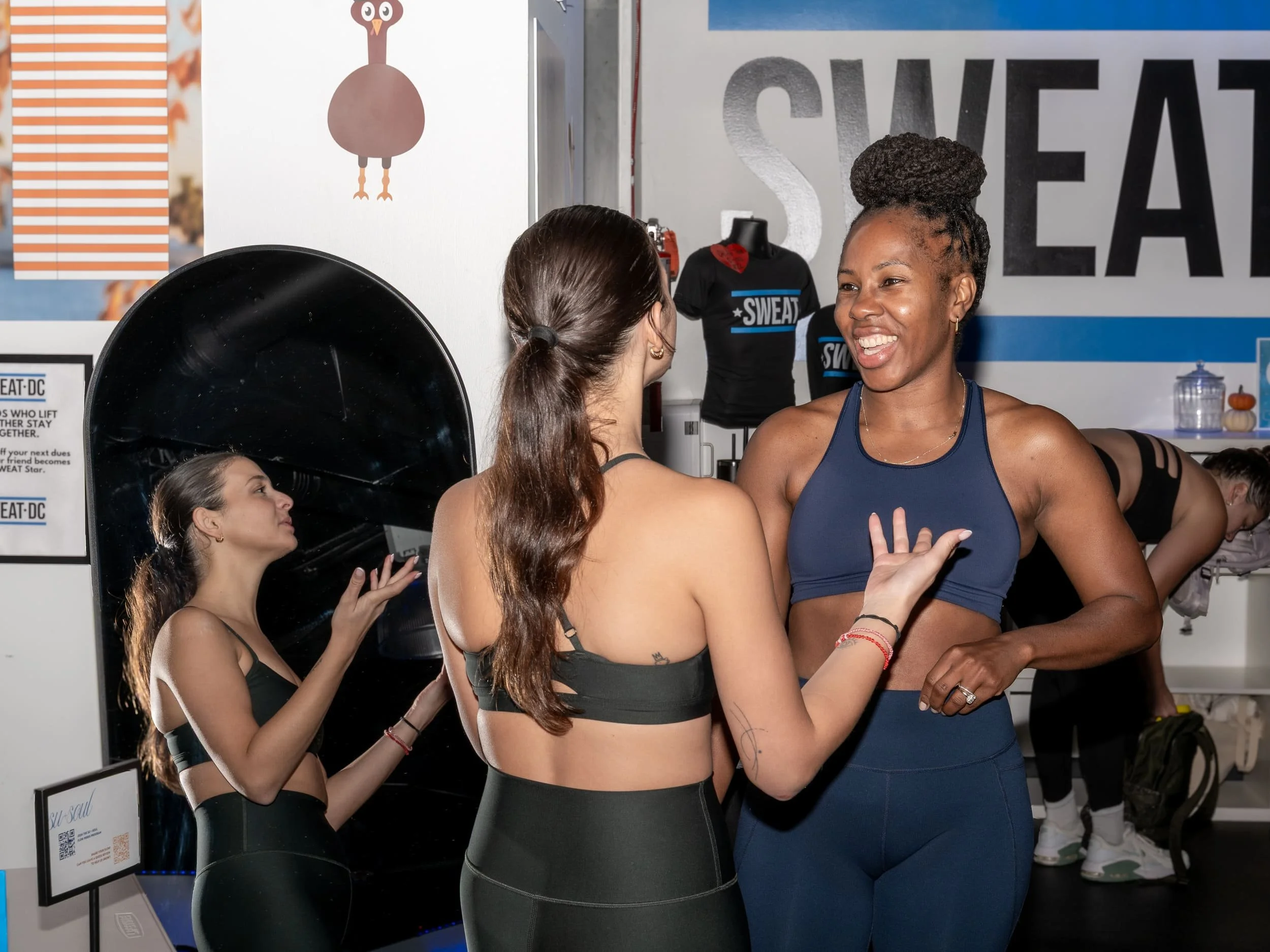 Guests smiling together at a curated pop-up experience