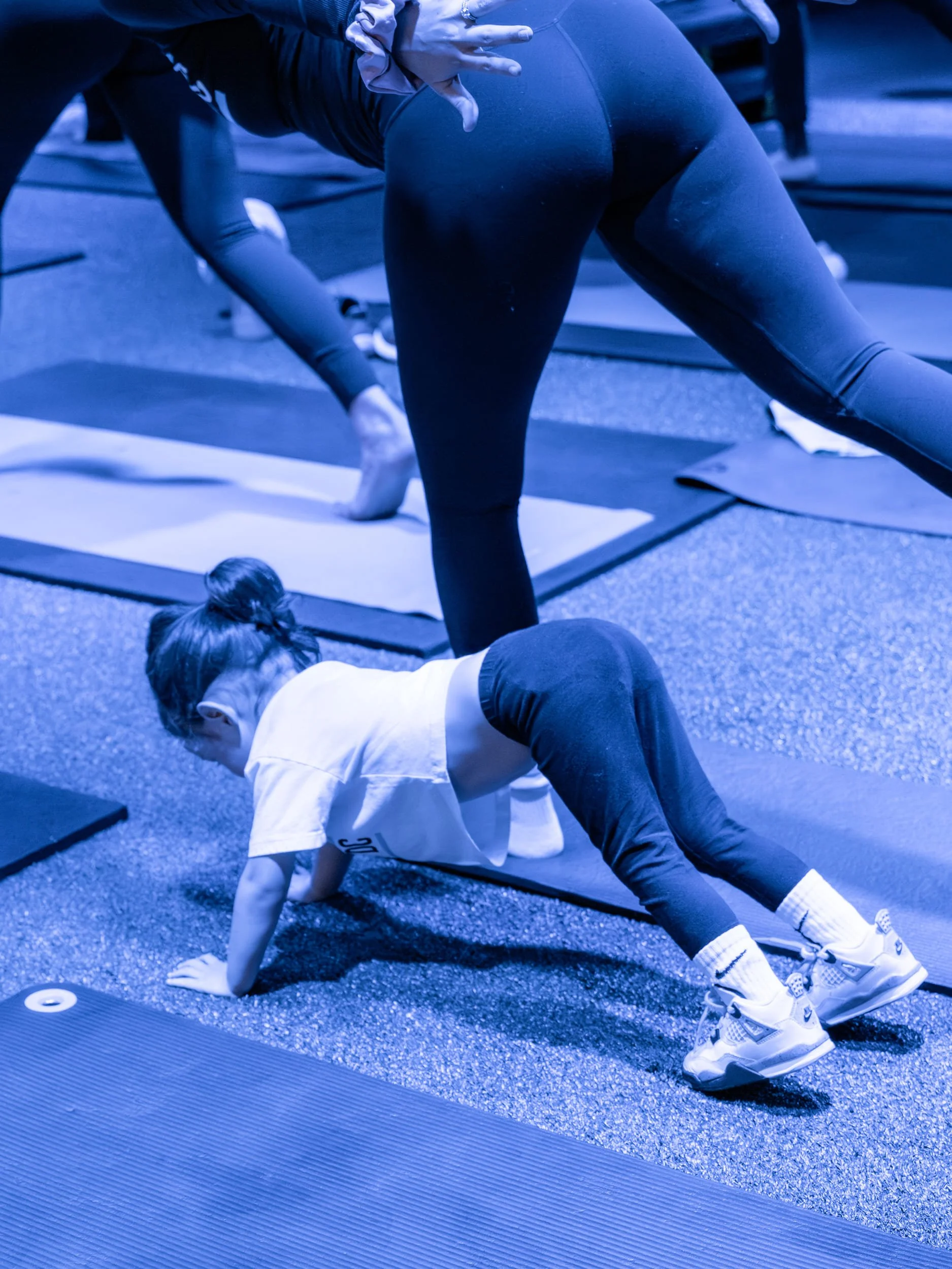 A young child participating in intentional movement at the Su + Soul pop-up event.