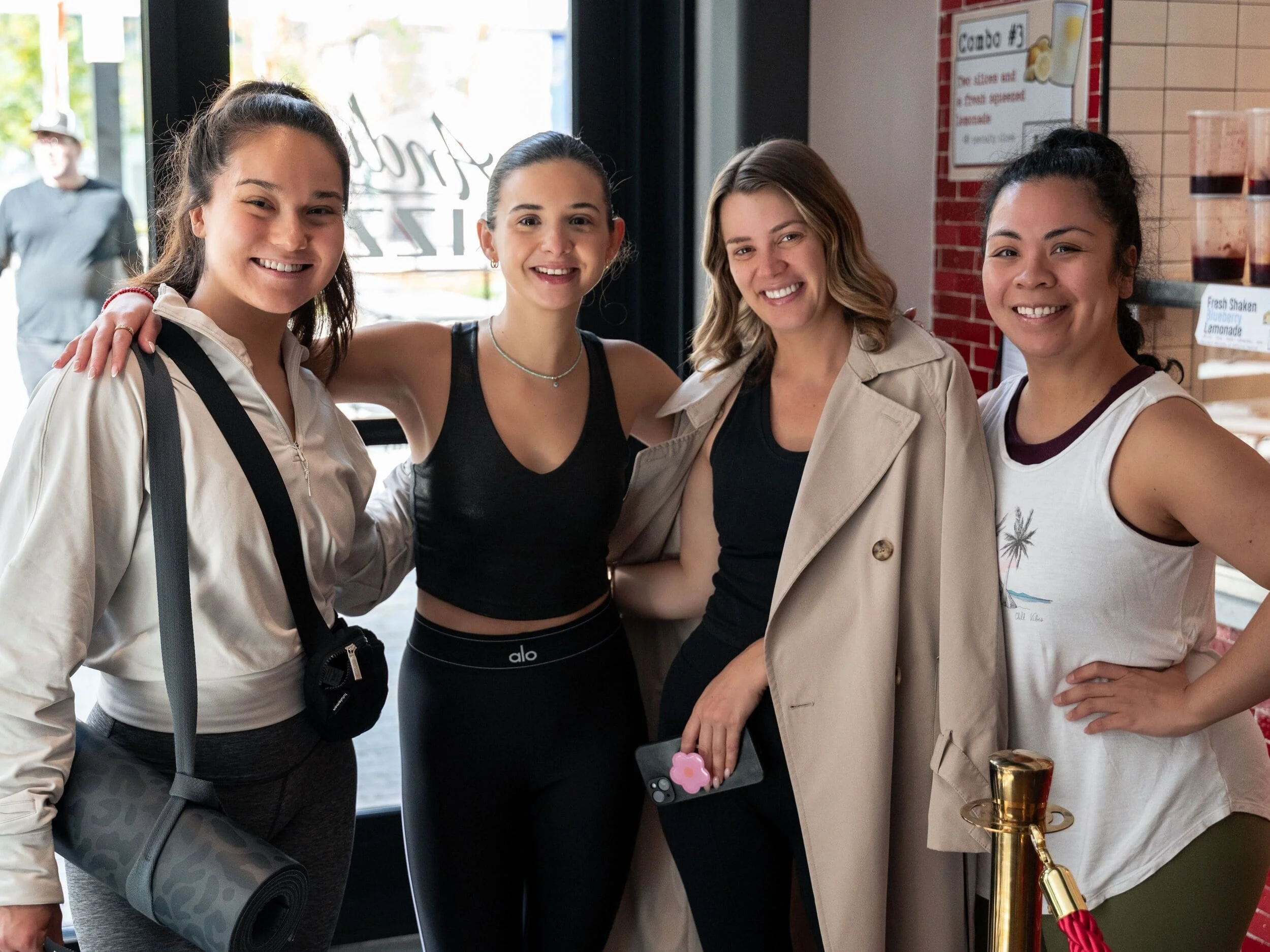 A photograph of Su + Soul's founder with three other women who have participated in a Pop-Up Event