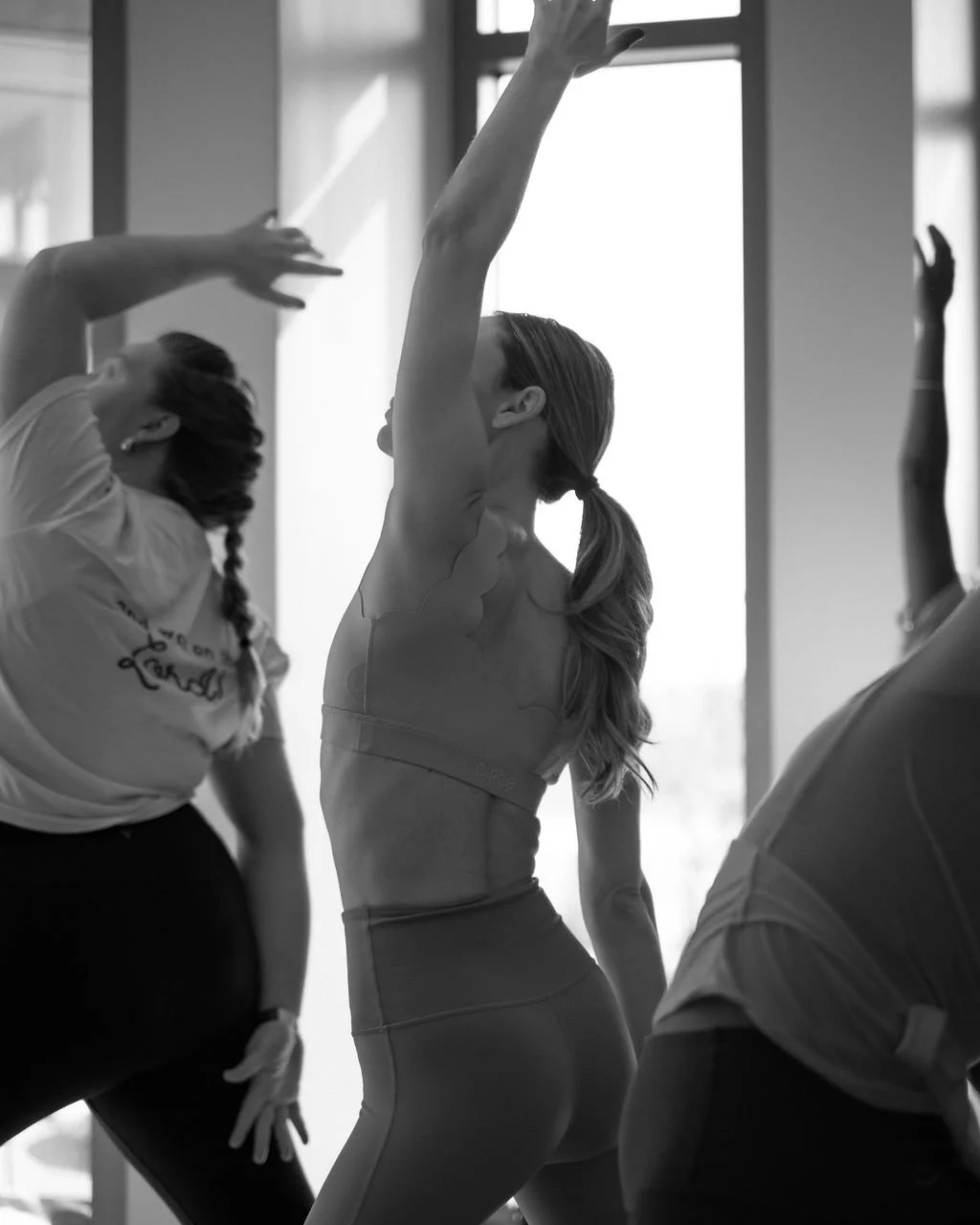 Guests flowing through a guided movement session at a Su + Soul  pop-up event