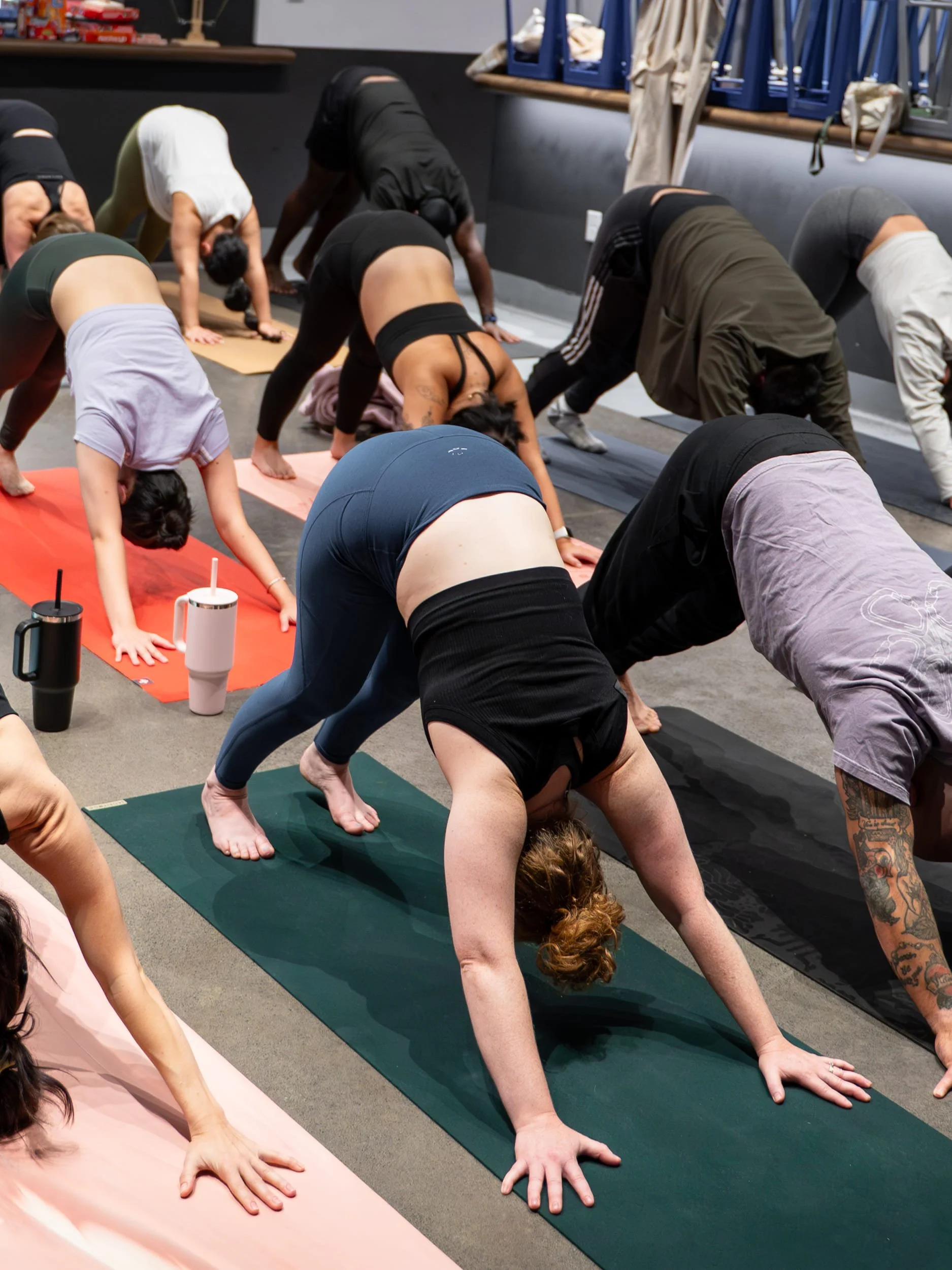 Community members following a group strength sequence