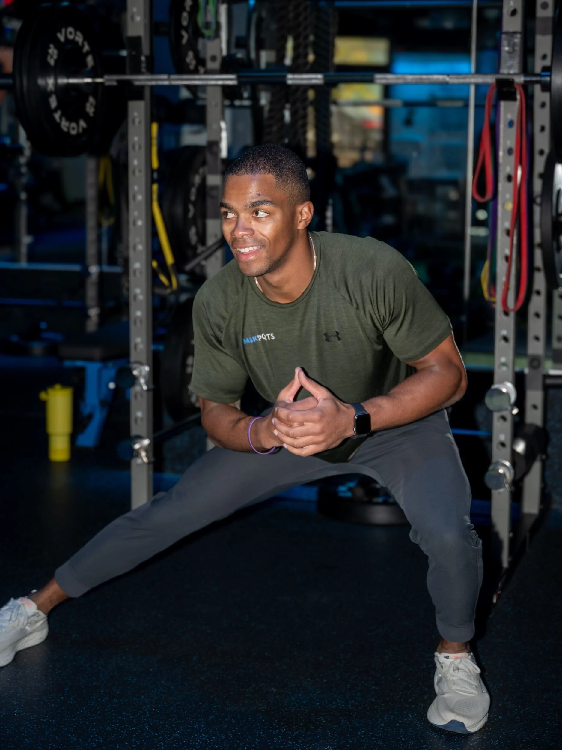 Attendee engaged in mindful movement during a group fitness session