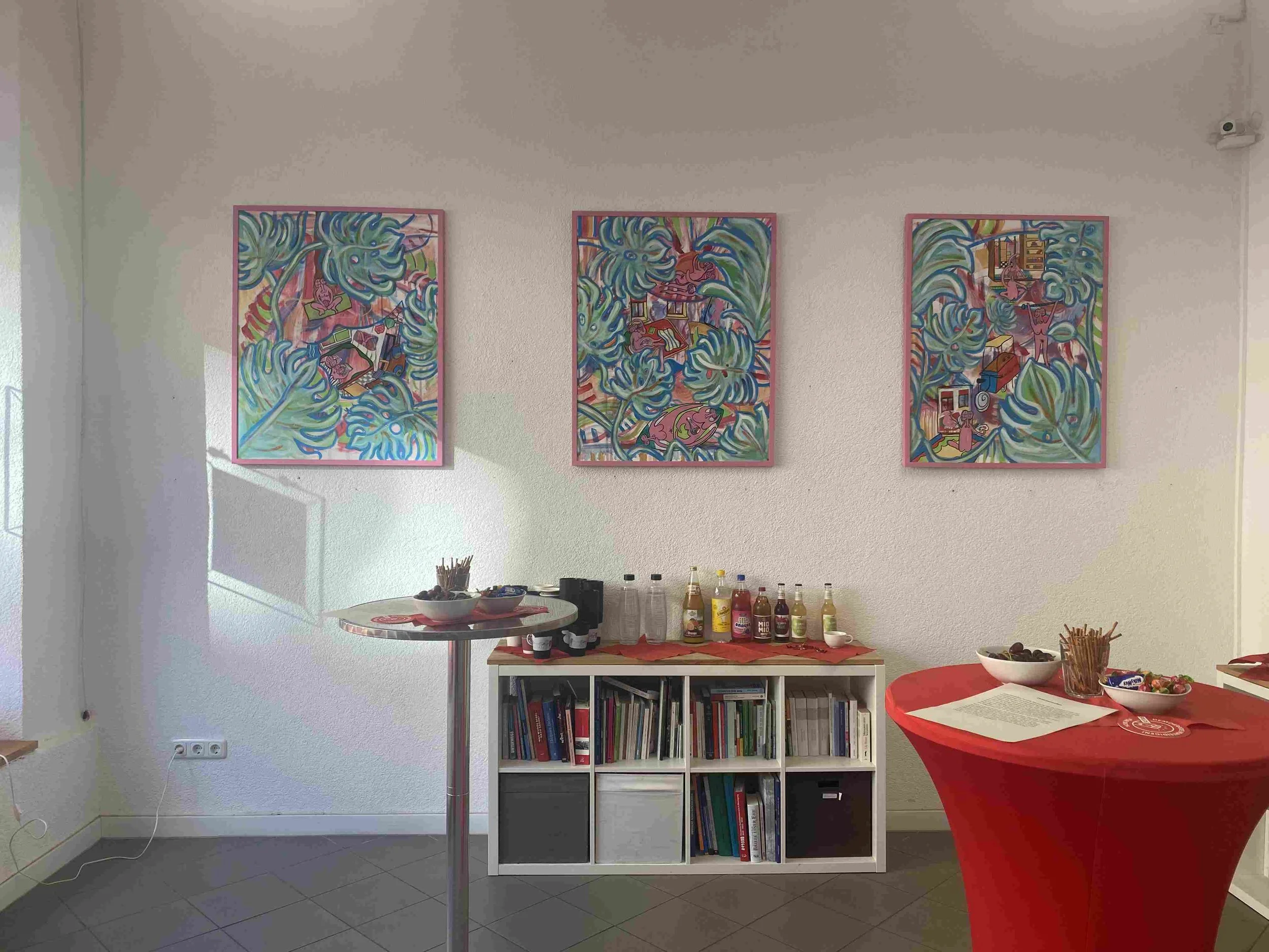 a triptych of paintings in an exhibition.jpg