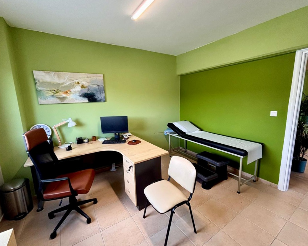 Consultation room at Asprou Healthcare medical clinic.