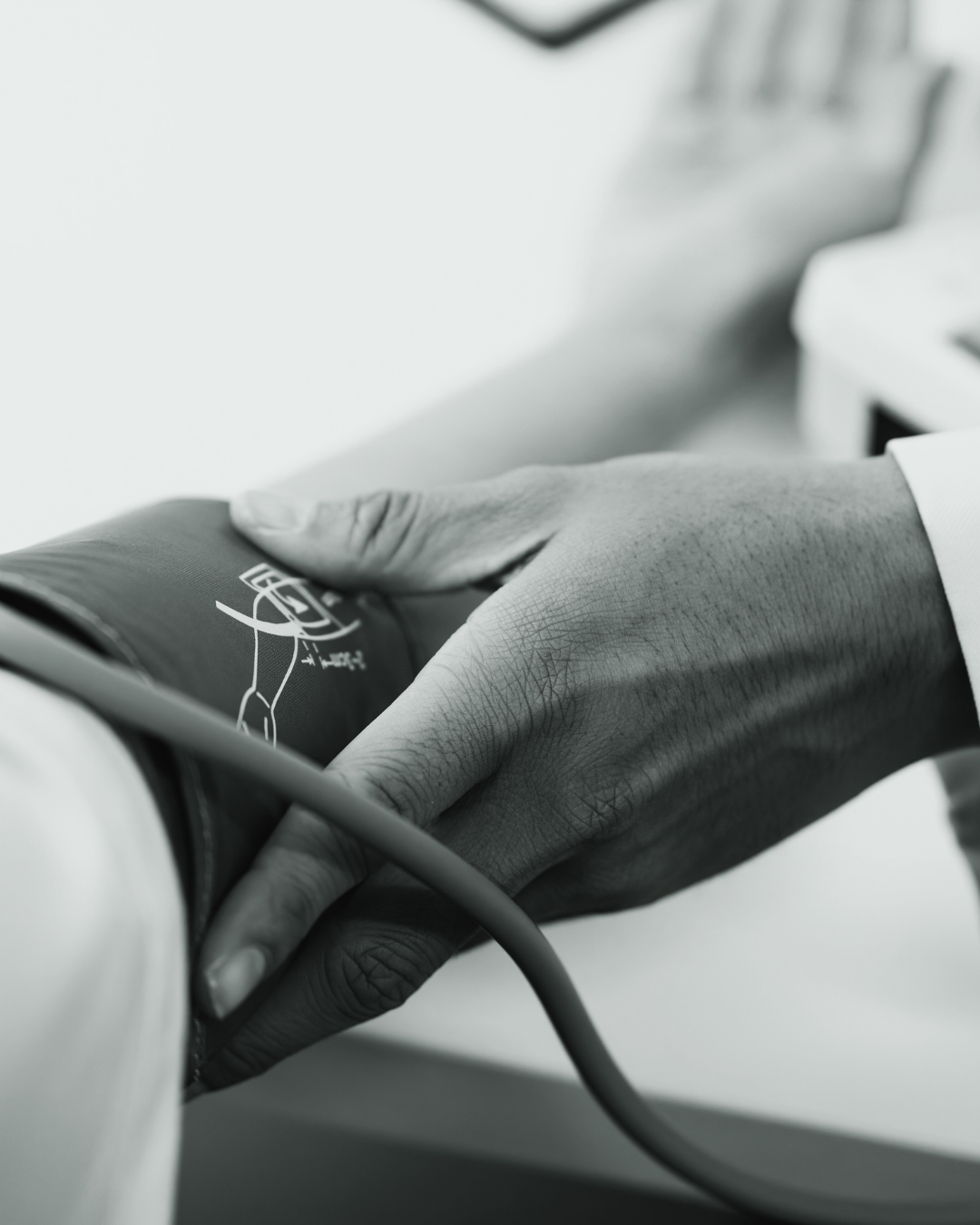 Blood pressure measurement during a routine primary care consultation.