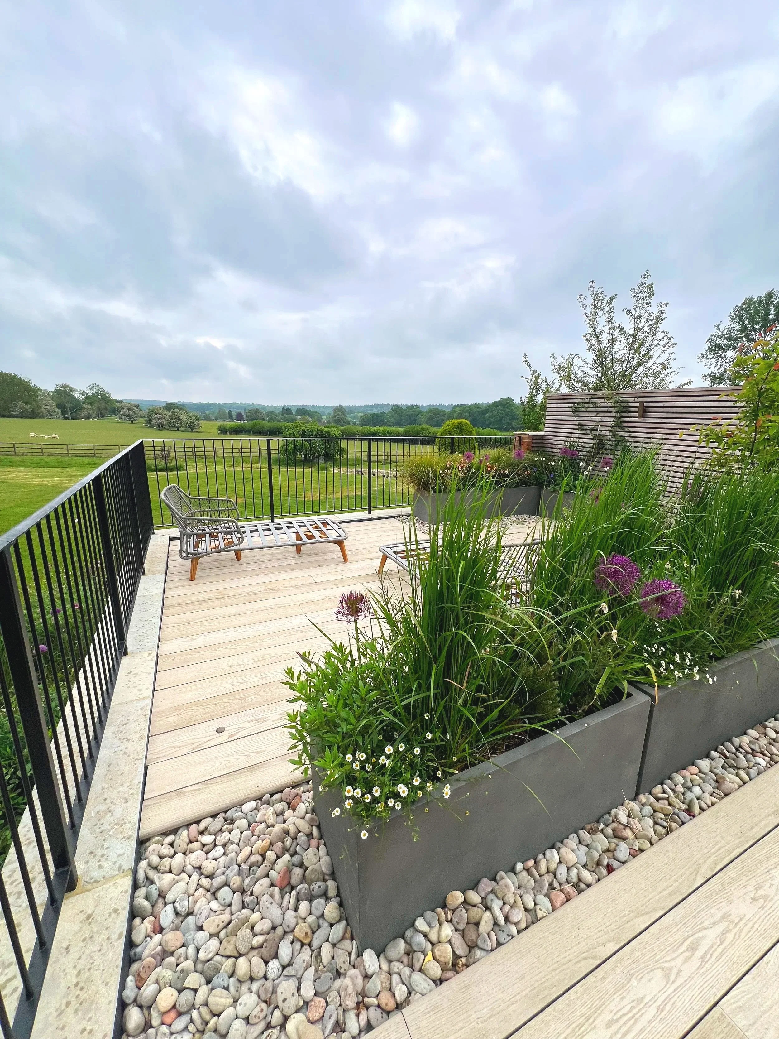 Planters and sunbeds in roof garden