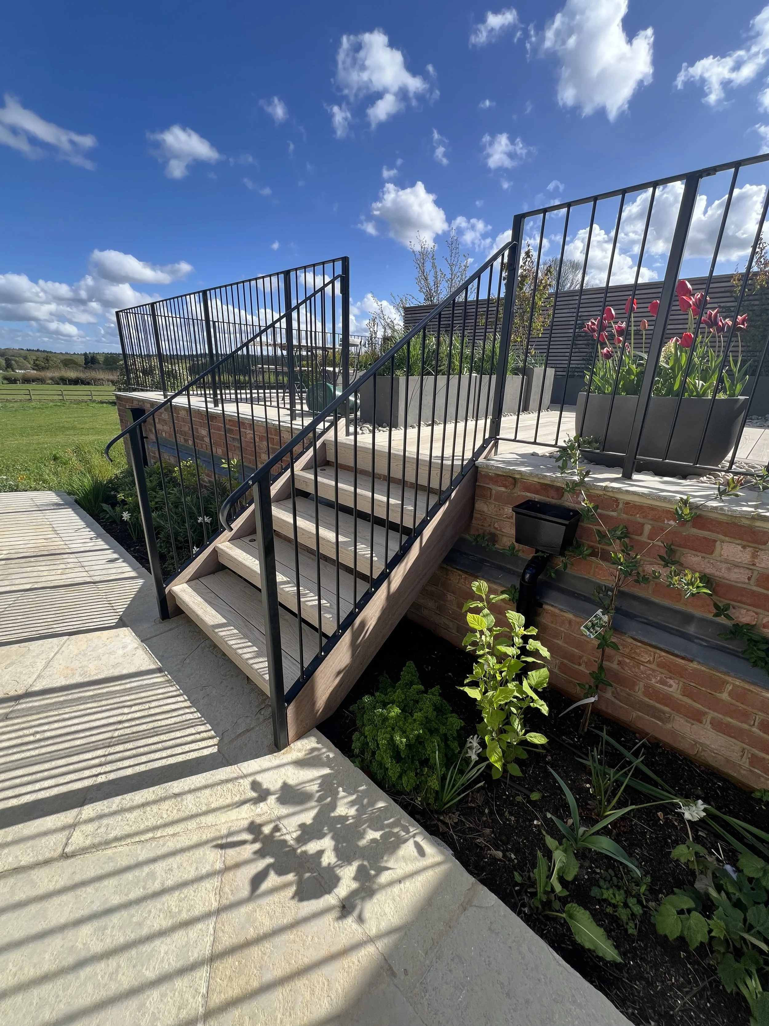Contemporary balustrade with steps up to roof garden