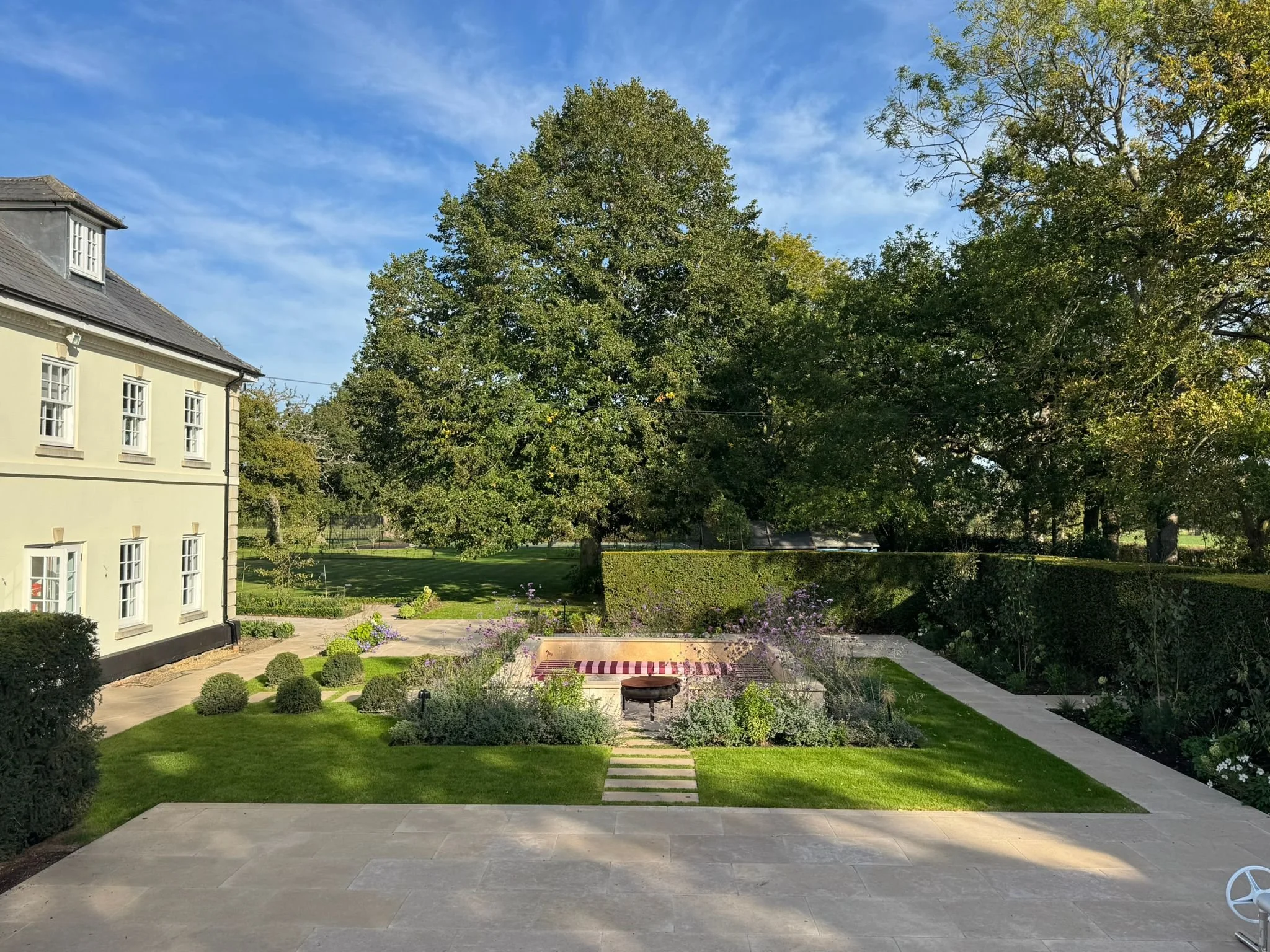 View across garden showing central socialising area