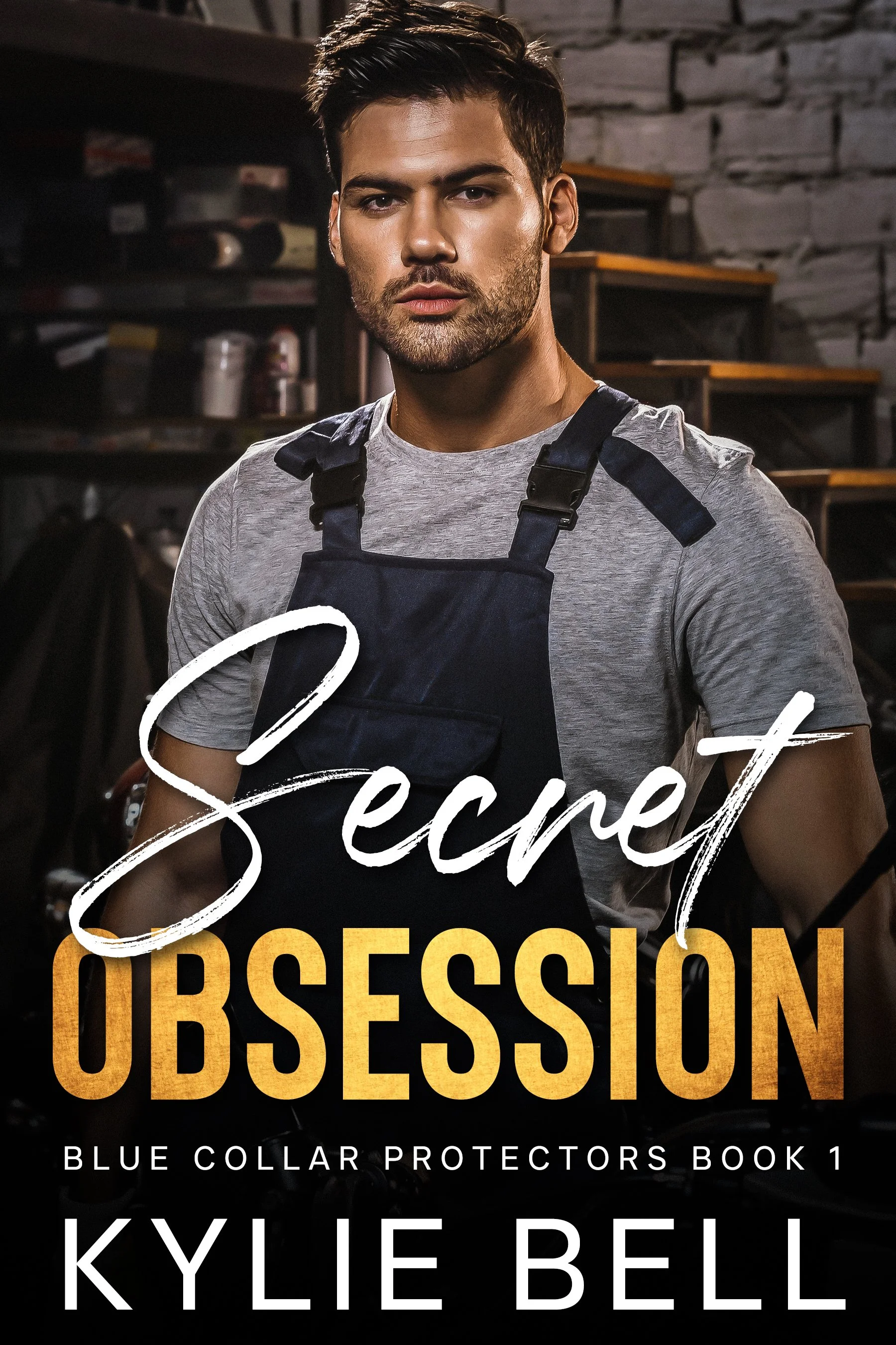 Secret Obsession, by Kylie Bell. Blue Collar Protectors Book one. A bearded man with shirt dark hair wearing overalls and gray t-shirt.