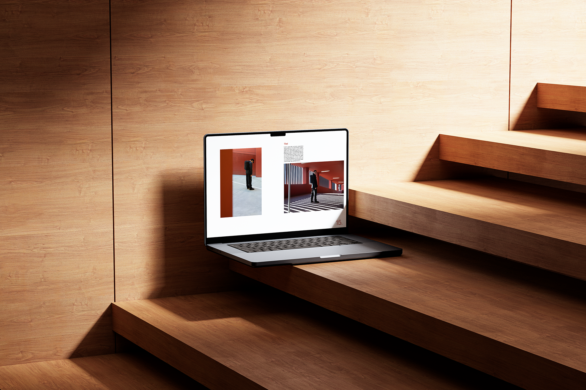 A laptop displaying an interior design magazine with images of a man in an orange room, placed on a wooden staircase with a light wood wall background.