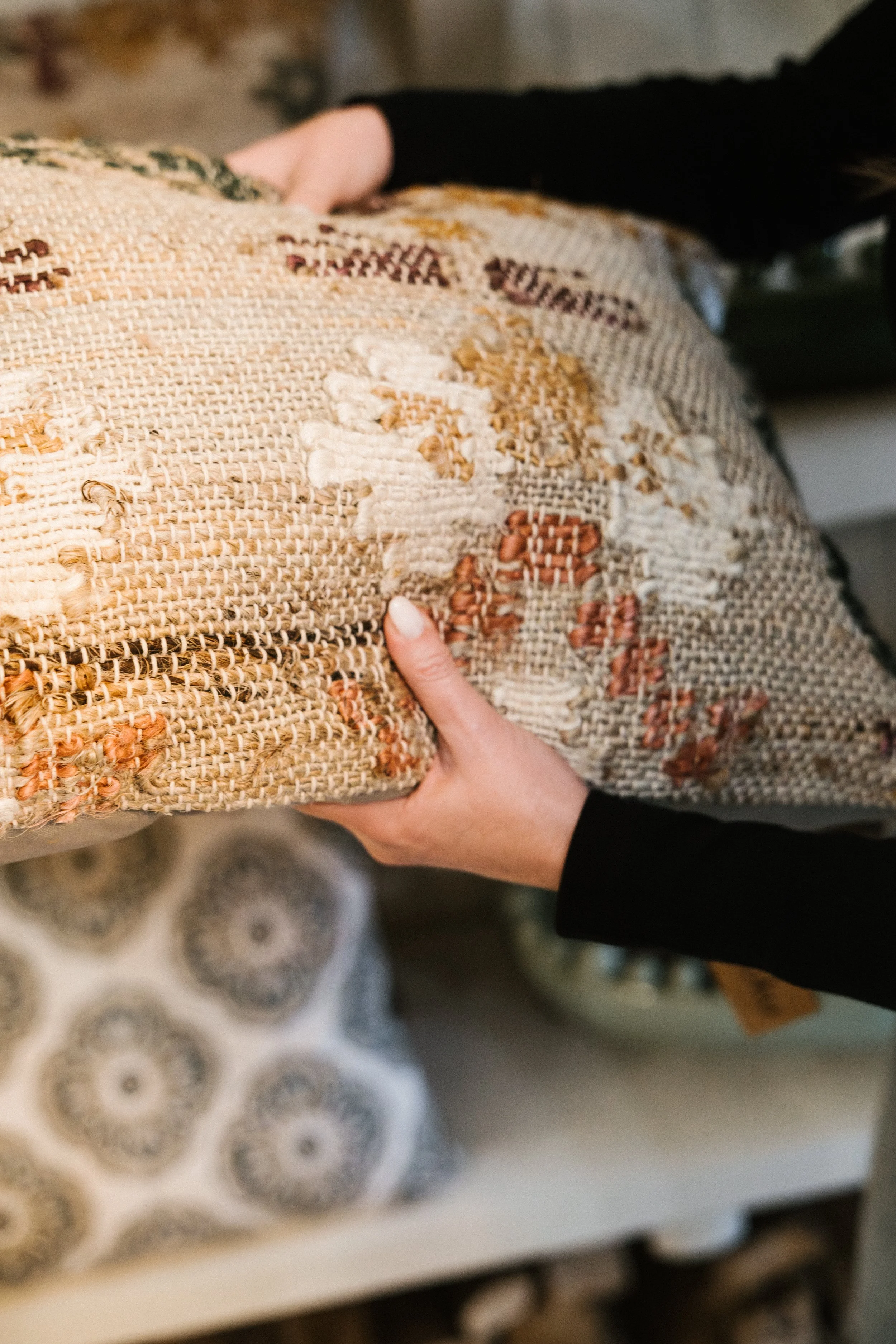 arranging a cushion for empty home staging Wales