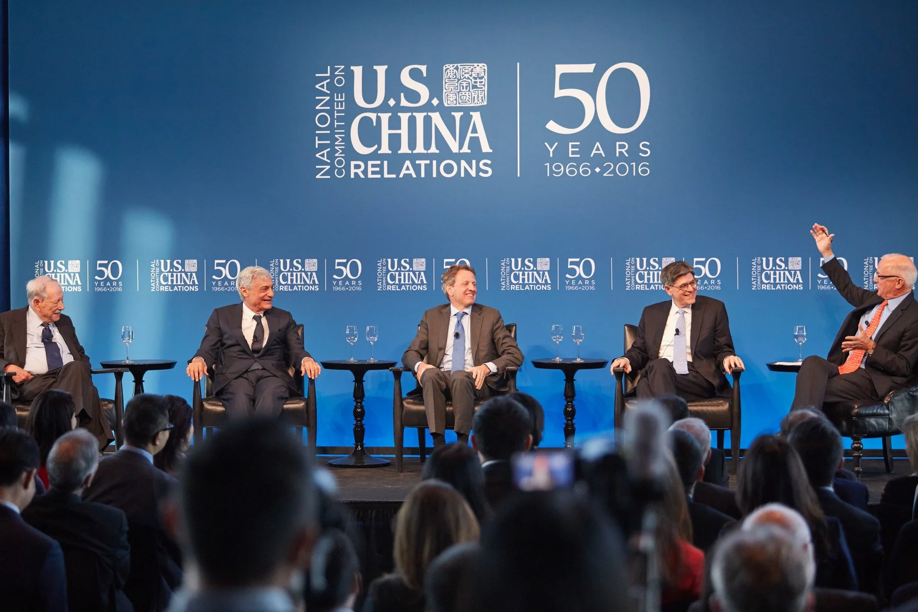 Panel discussion at National Committee on U.S.-China Relations 50th anniversary event with five men seated on stage.