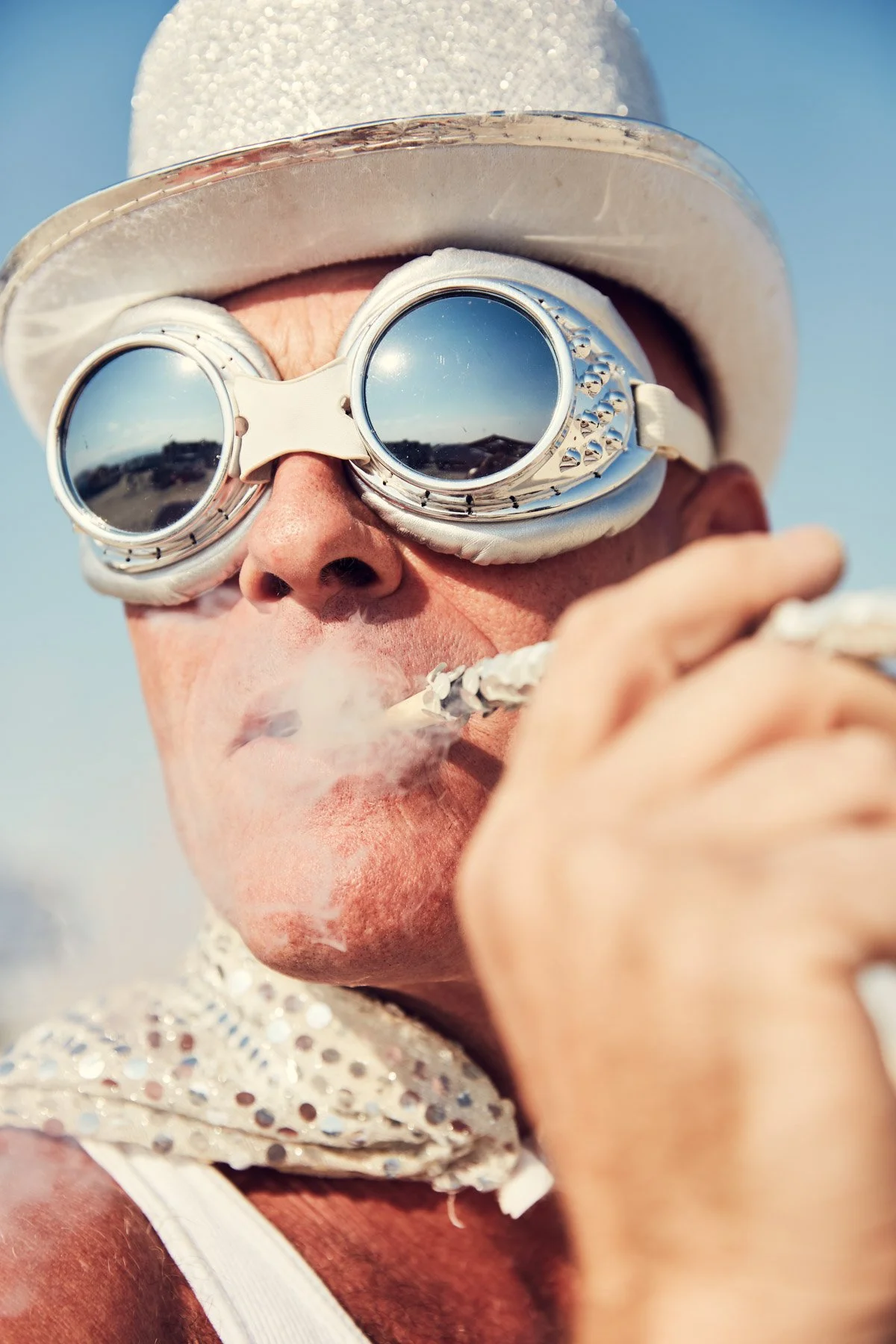 Burning Man 2018 Man Smoking Silver Goggles
