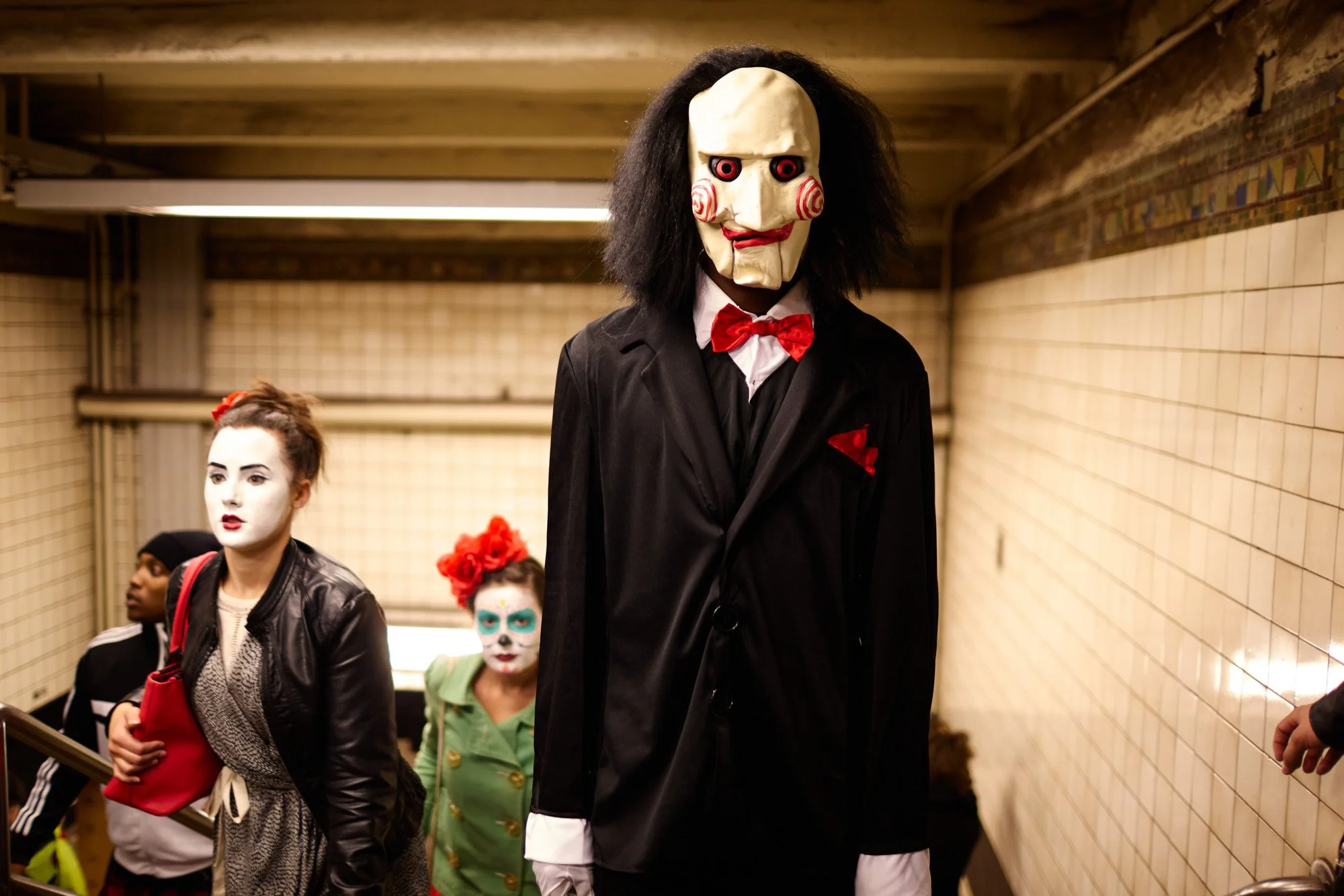 jigsaw-mask-subway-nyc-halloween-julianwalter.jpg