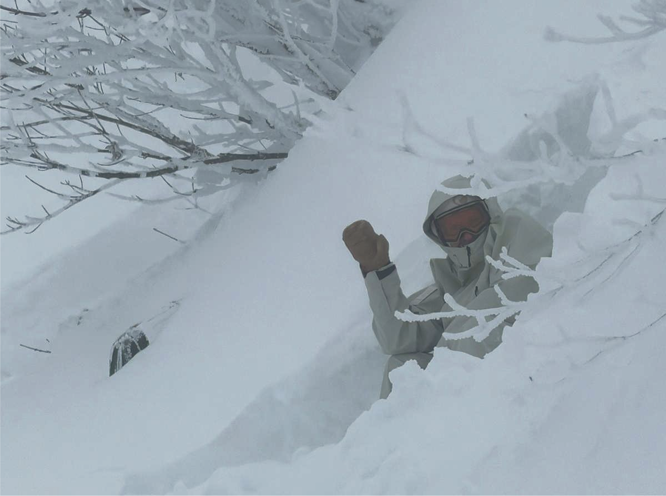 Ingemar Backman in deep Japanes powder presenting new clothing, apparel and snowboard for Atlantis Ghost Town.