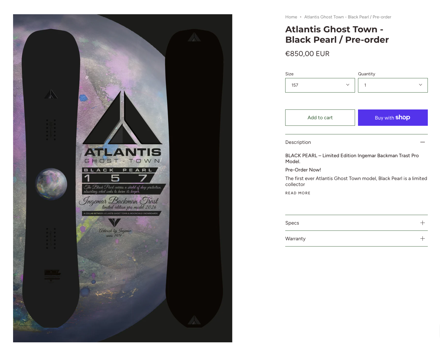 Image of a snowboard with a black and space-themed design, featuring the Atlantis Ghost Town logo, a planet, and text about the Black Pearl edition.
