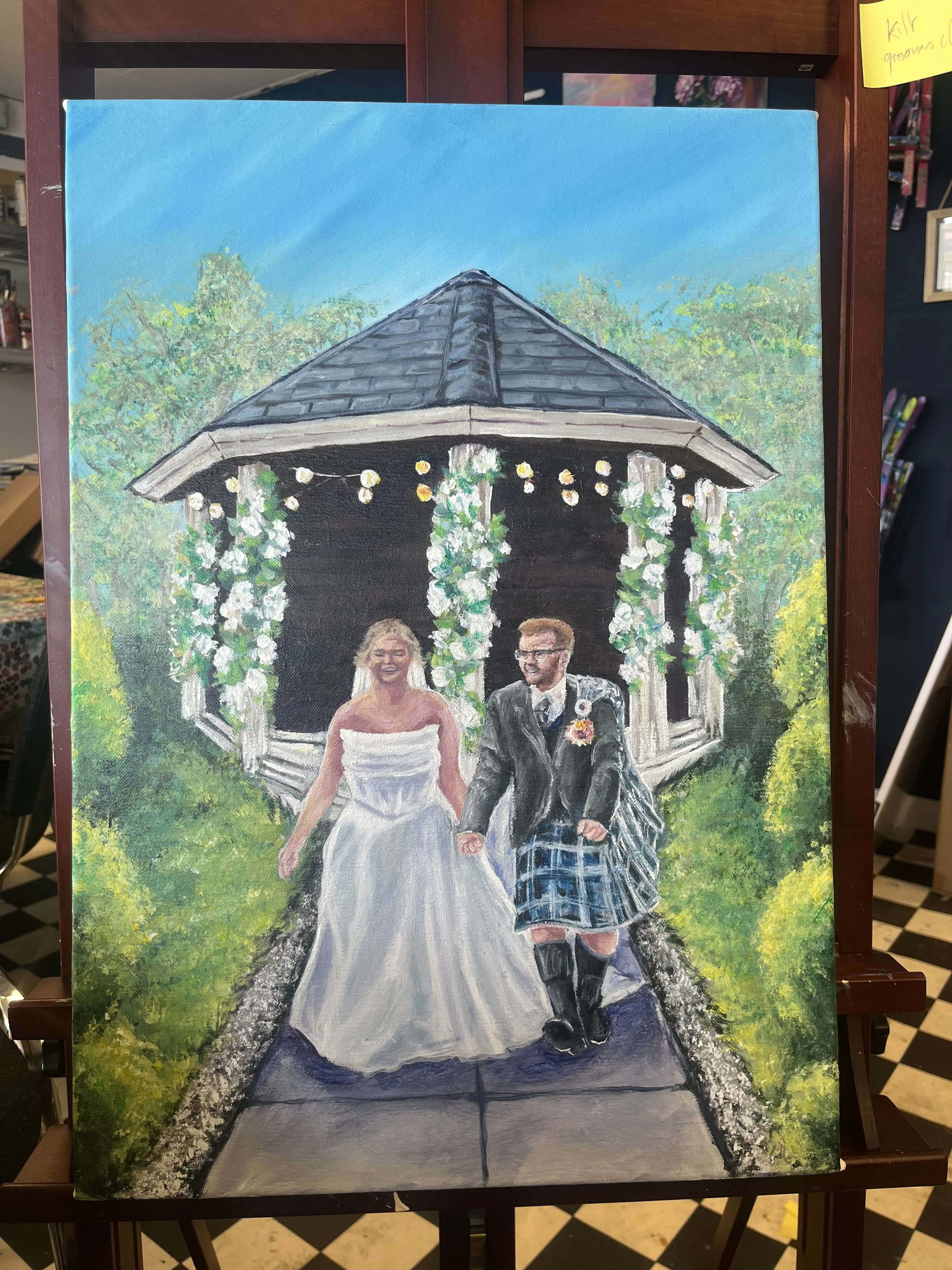 A painting of a bride and groom walking under a gazebo decorated with white flowers and hanging lights, surrounded by green trees and a blue sky.