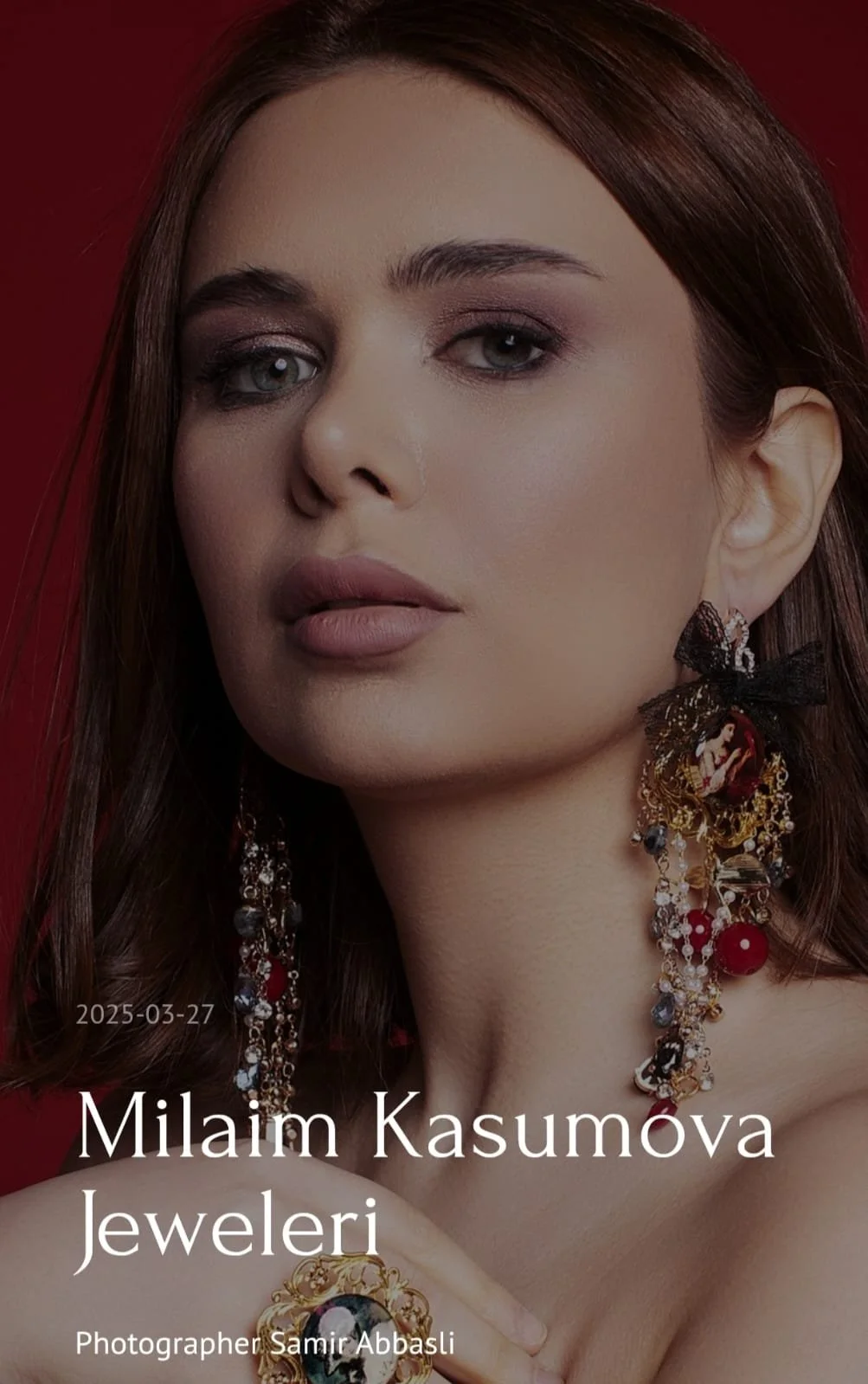 Close-up portrait of a woman with long brown hair, wearing elaborate jewelry including large earrings and a ring, against a red background. Text on the image reads "2025-03-27 Milaim Kasumova Jewelry Photographer Samir Abbasi."