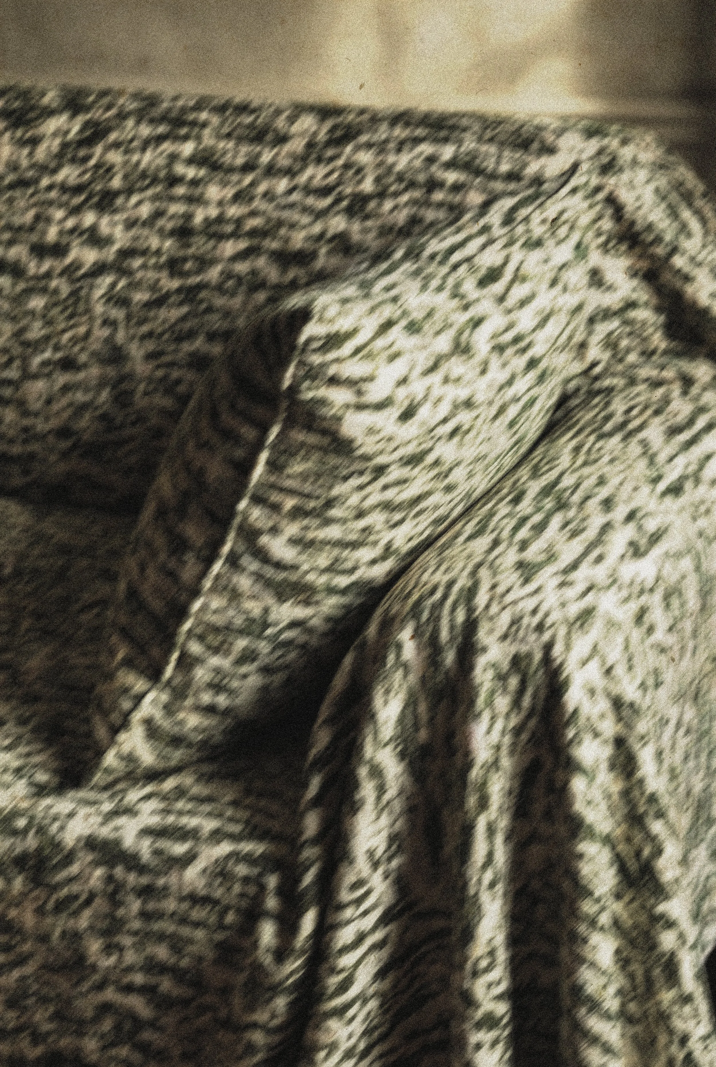 Close-up of textured fabric in animal print.
