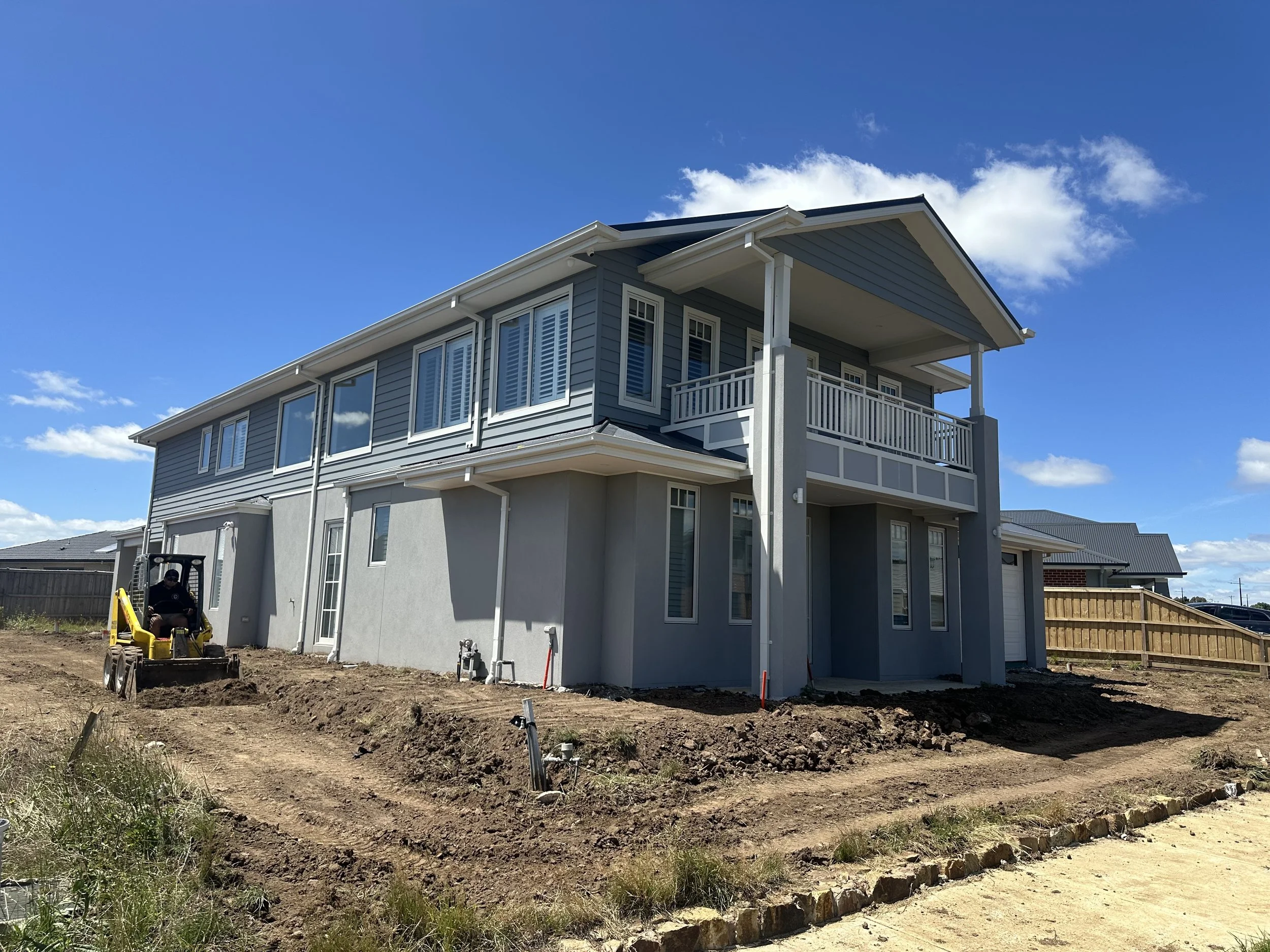 Custom home under construction in Melbourne with timber framing