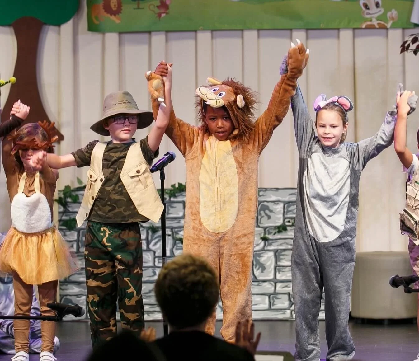 Elementary students bowing at school play for Cornerstone Christian Academy in Peachtree Corners